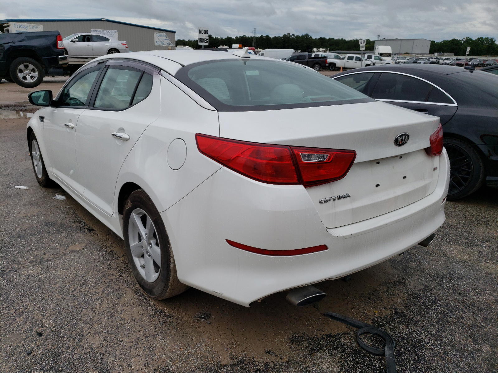 Photo 3 from auction – 2015 KIA OPTIMA LX with VIN KNAGM4A74F5660850