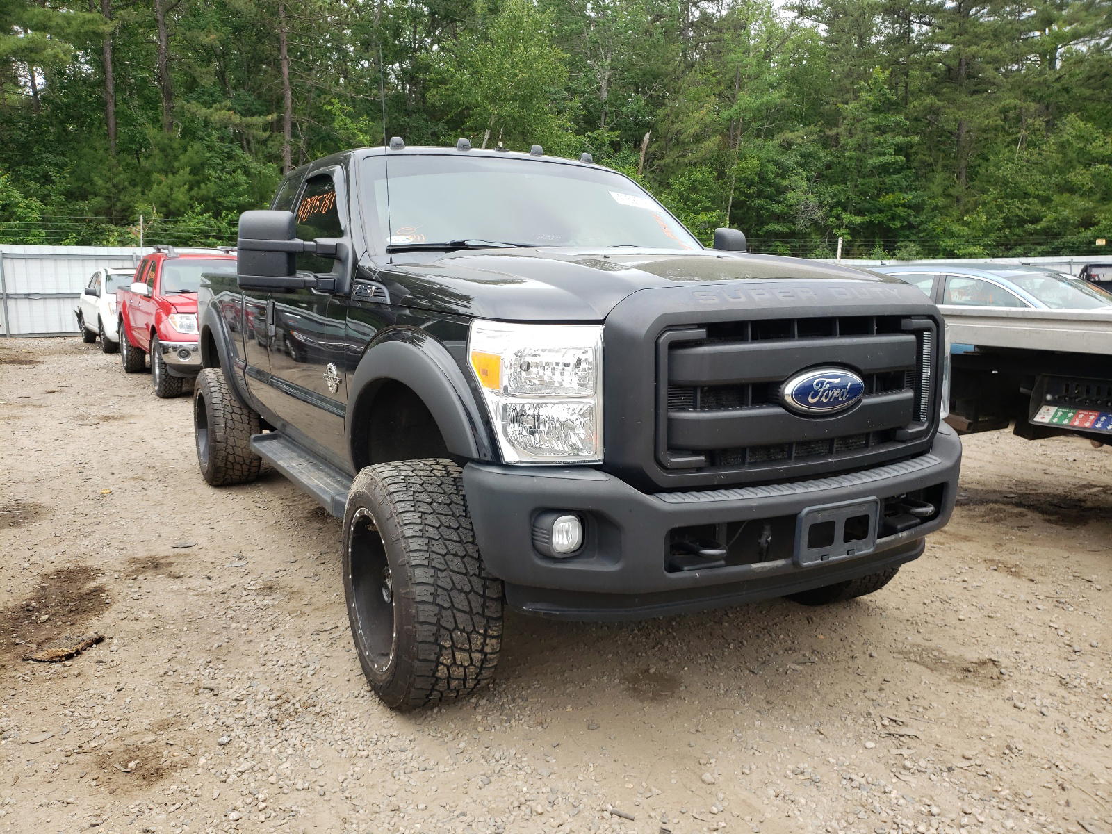 FORD F250 SUPER 2011 with VIN 1FT7X2BT3BEB47299 - Photo from auction