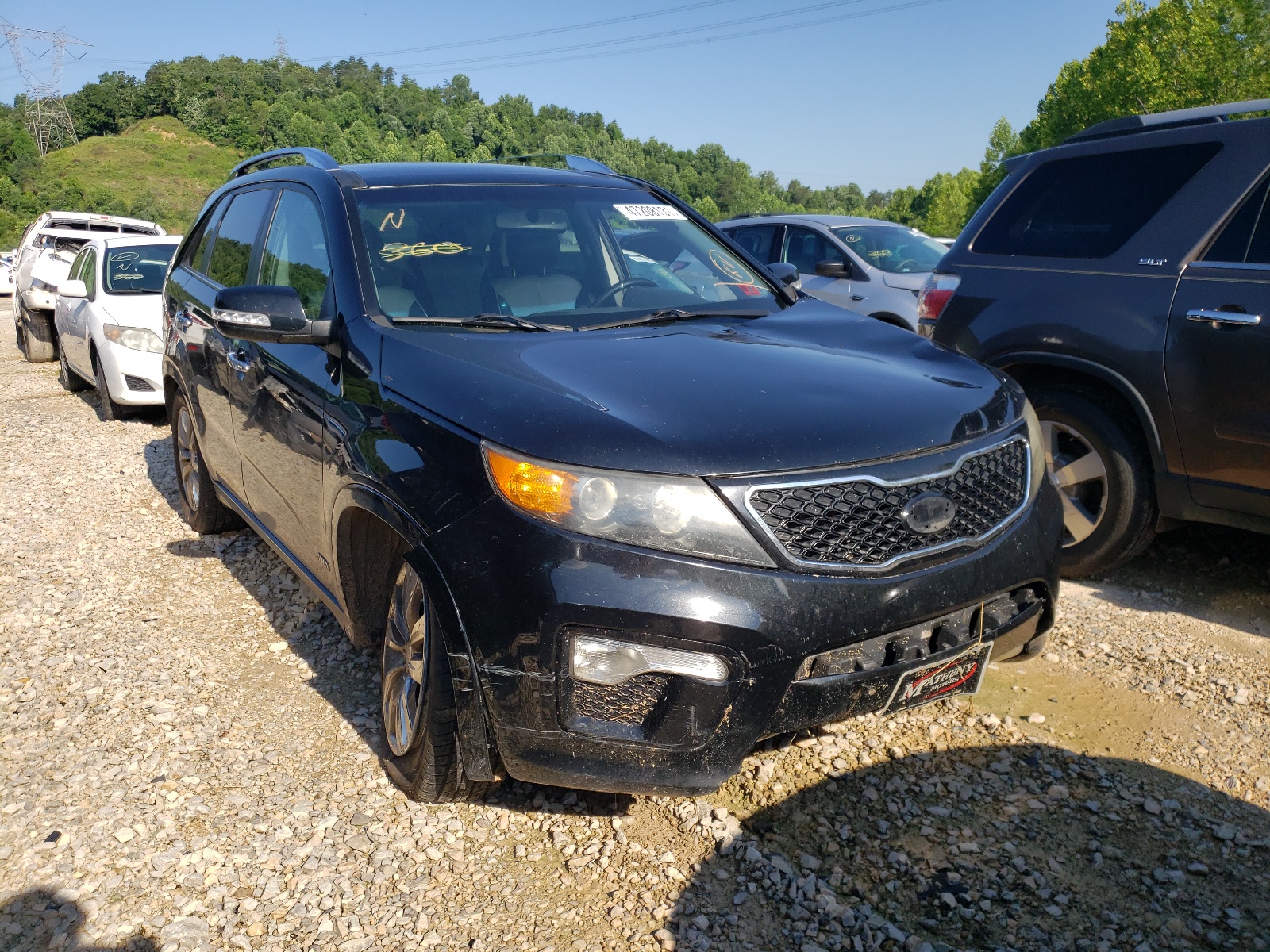 KIA SORENTO SX 2012 with VIN 5XYKWDA23CG210282 - Photo from auction