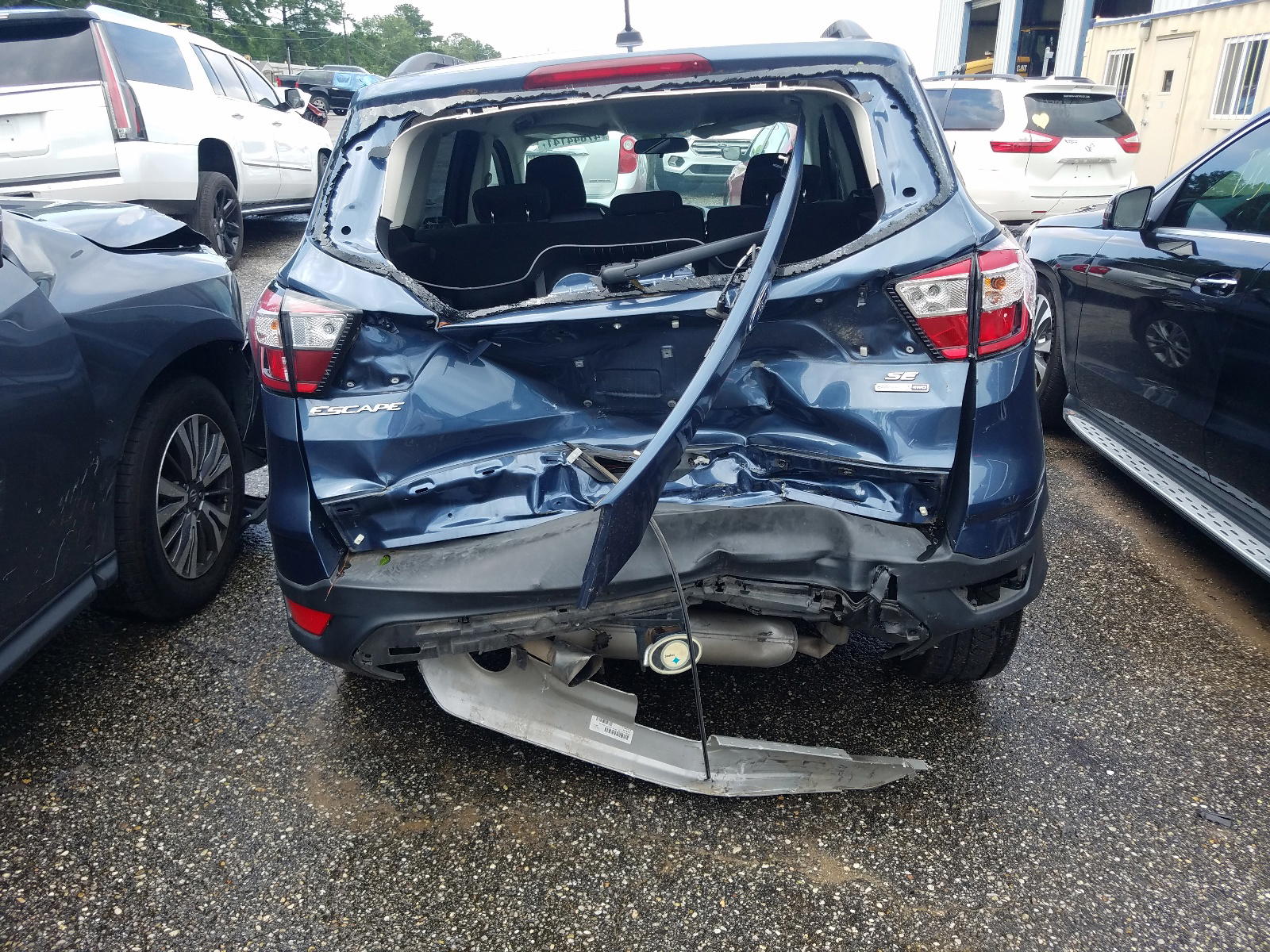 Photo 9 from auction – 2018 FORD ESCAPE SE with VIN 1FMCU9GD3JUB12943