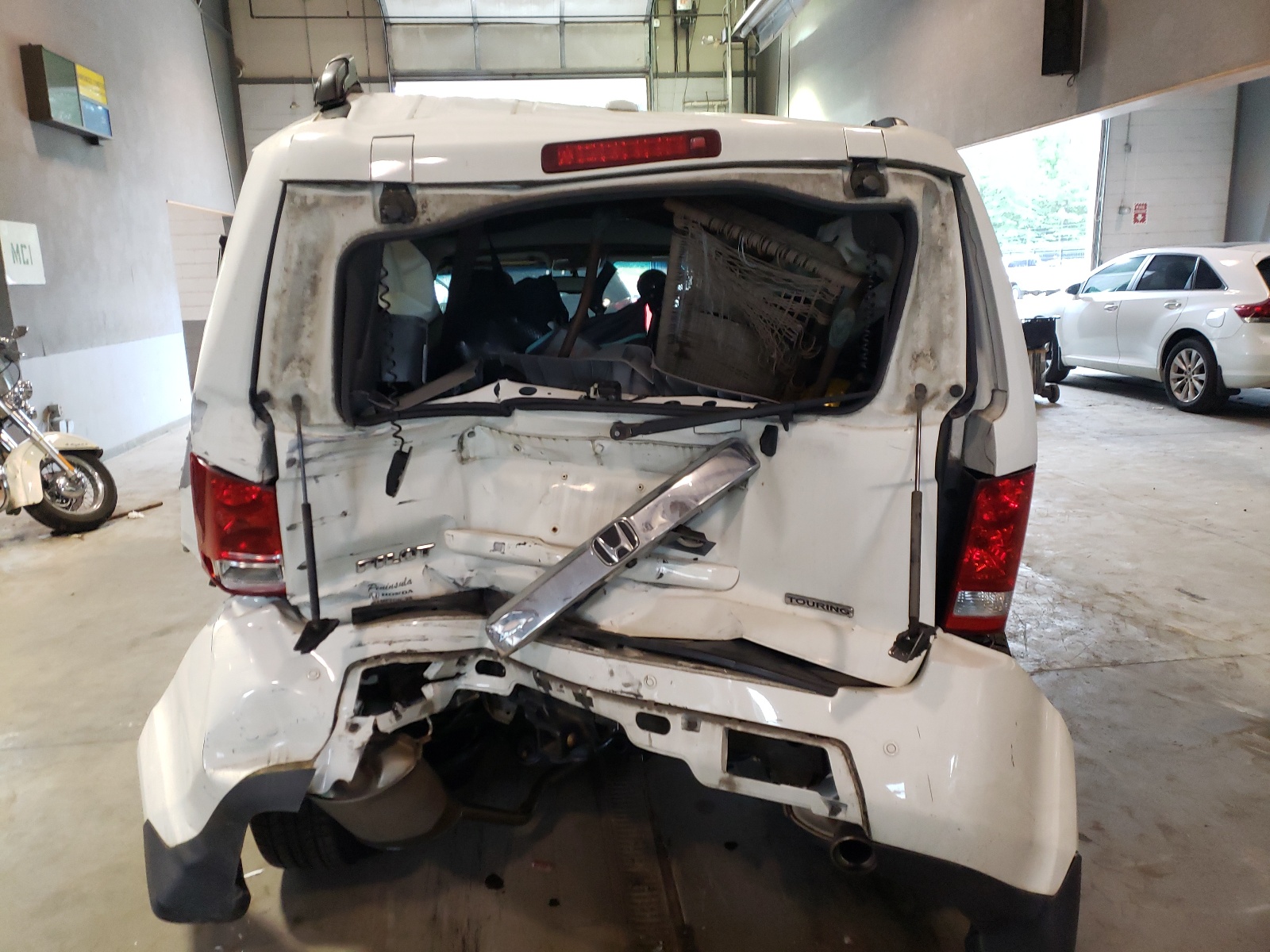 Photo 9 from auction – 2010 HONDA PILOT TOUR with VIN 5FNYF3H81AB001027