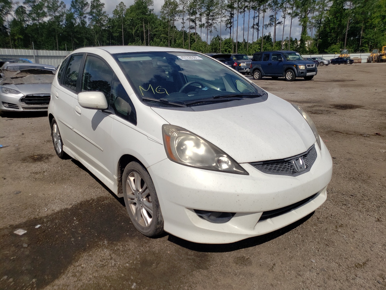 HONDA FIT 2009 with VIN JHMGE874X9S021168 - Photo from auction