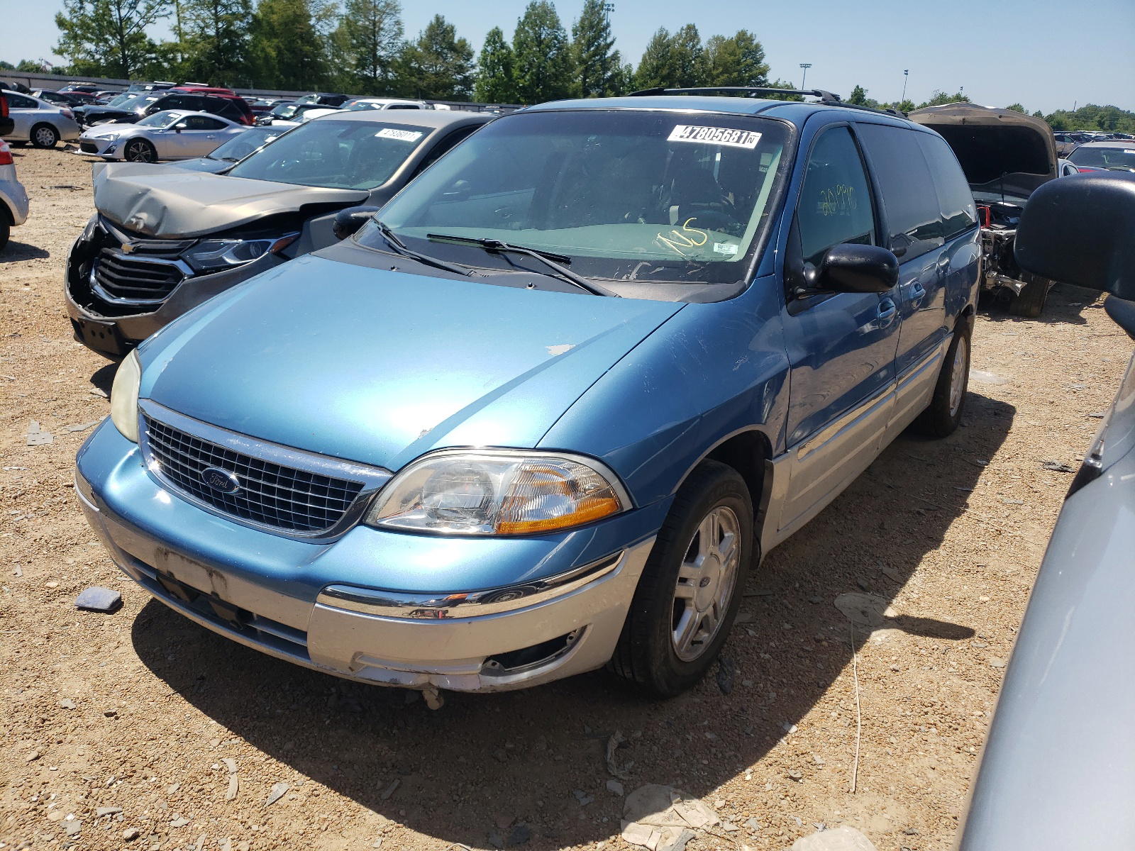 Photo 2 from auction – 2002 FORD WINDSTAR S with VIN 2FMZA534X2BA40387