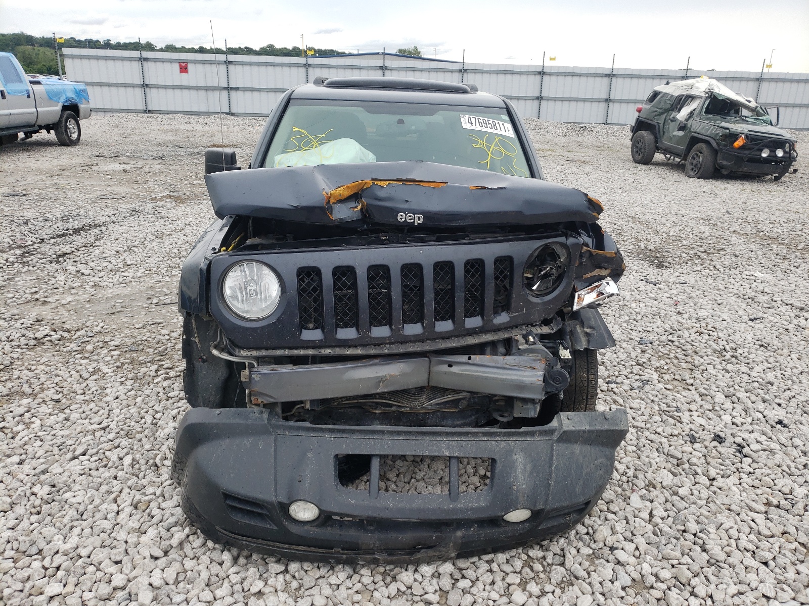 Photo 9 from auction – 2014 JEEP PATRIOT LA with VIN 1C4NJPFB4ED717702