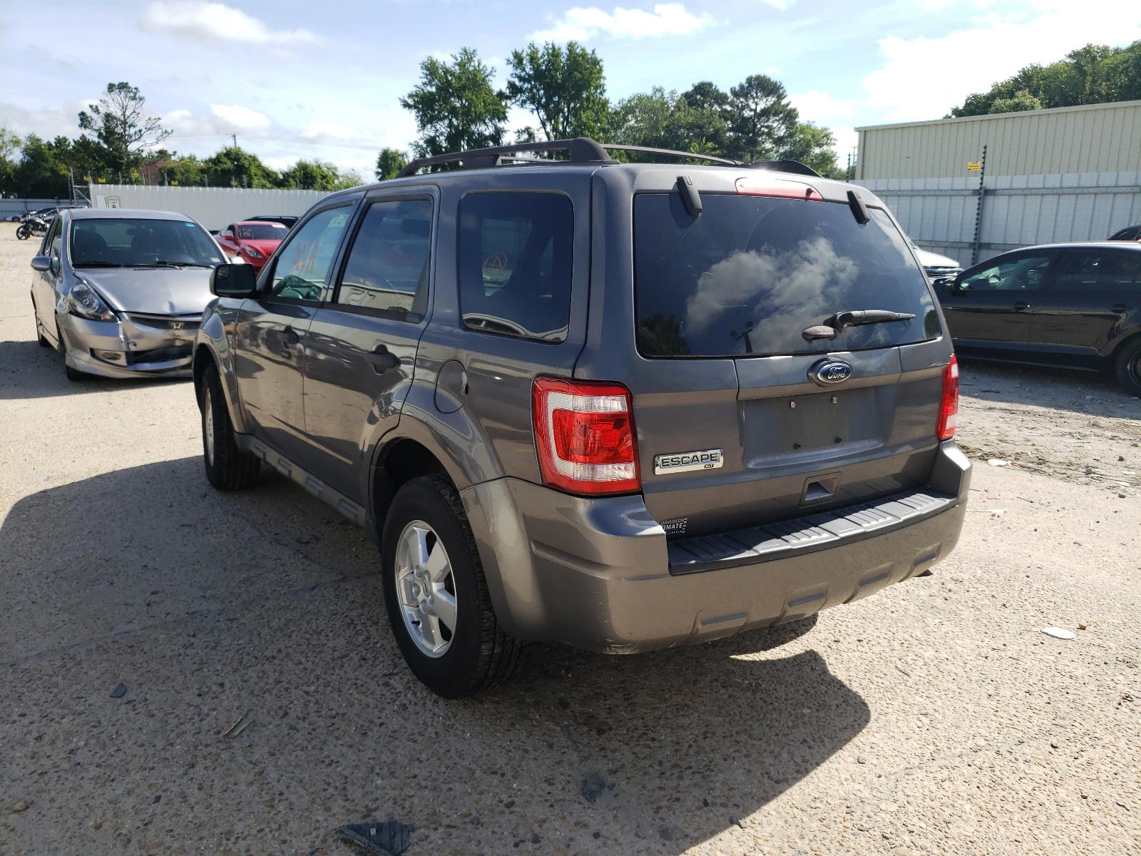 Photo 3 from auction – 2011 FORD ESCAPE XLT with VIN 1FMCU0D79BKA79289