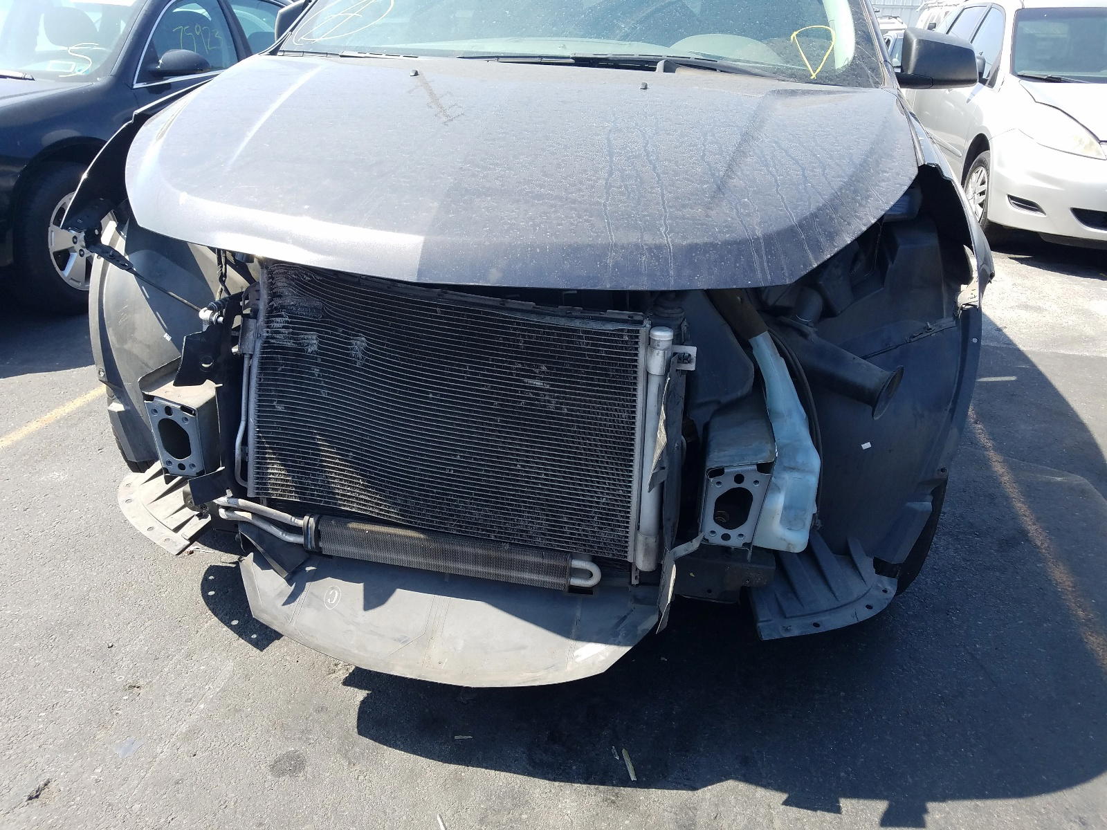 Photo 9 from auction – 2016 CHEVROLET TRAVERSE L with VIN 1GNKRFKD2GJ299780