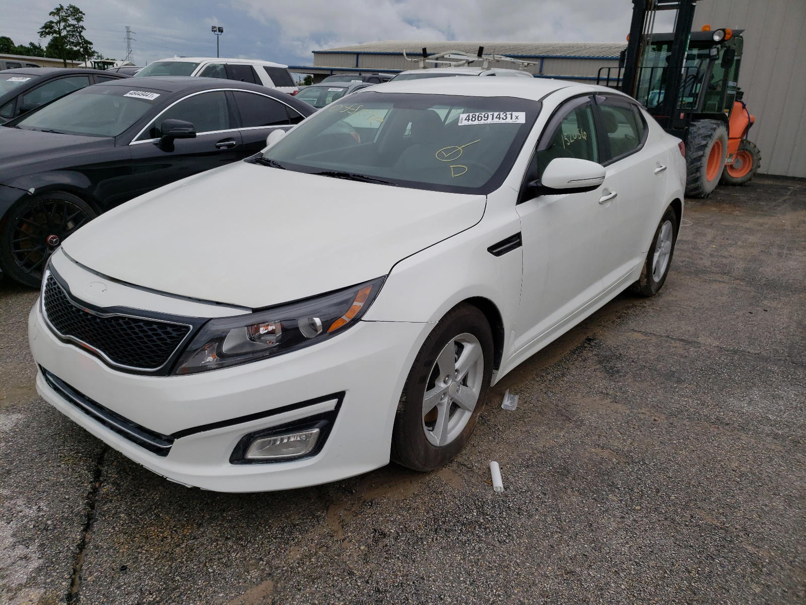 Photo 2 from auction – 2015 KIA OPTIMA LX with VIN KNAGM4A74F5660850