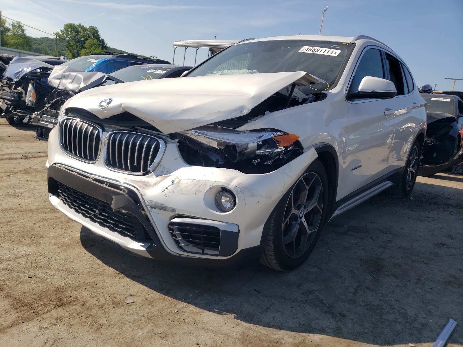 Photo 2 from auction – 2017 BMW X1 SDRIVE2 with VIN WBXHU7C35H5H34580