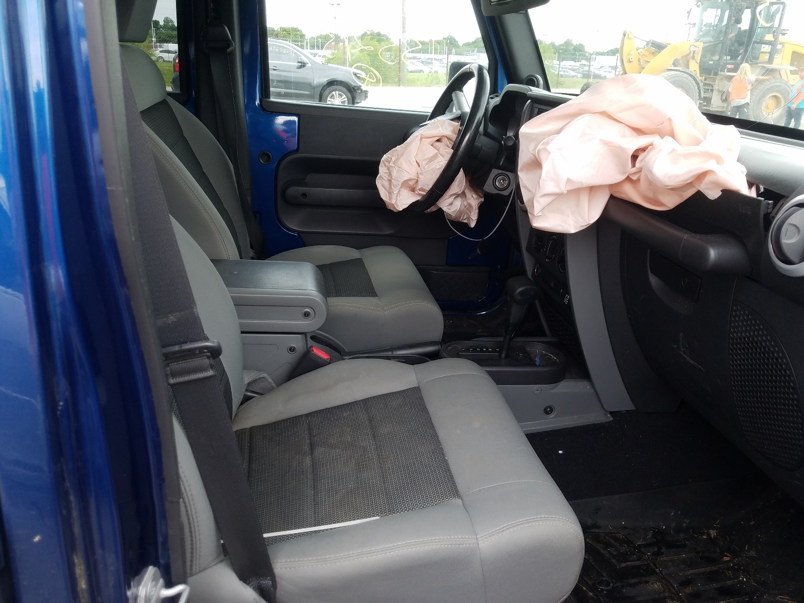 Photo 5 from auction – 2010 JEEP WRANGLER U with VIN 1J4BA5H10AL135215