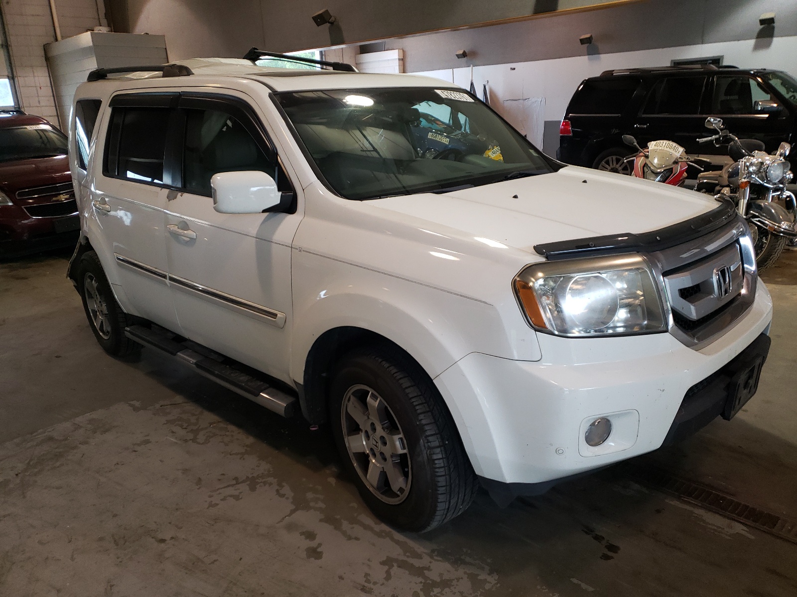 Photo 1 from auction – 2010 HONDA PILOT TOUR with VIN 5FNYF3H81AB001027