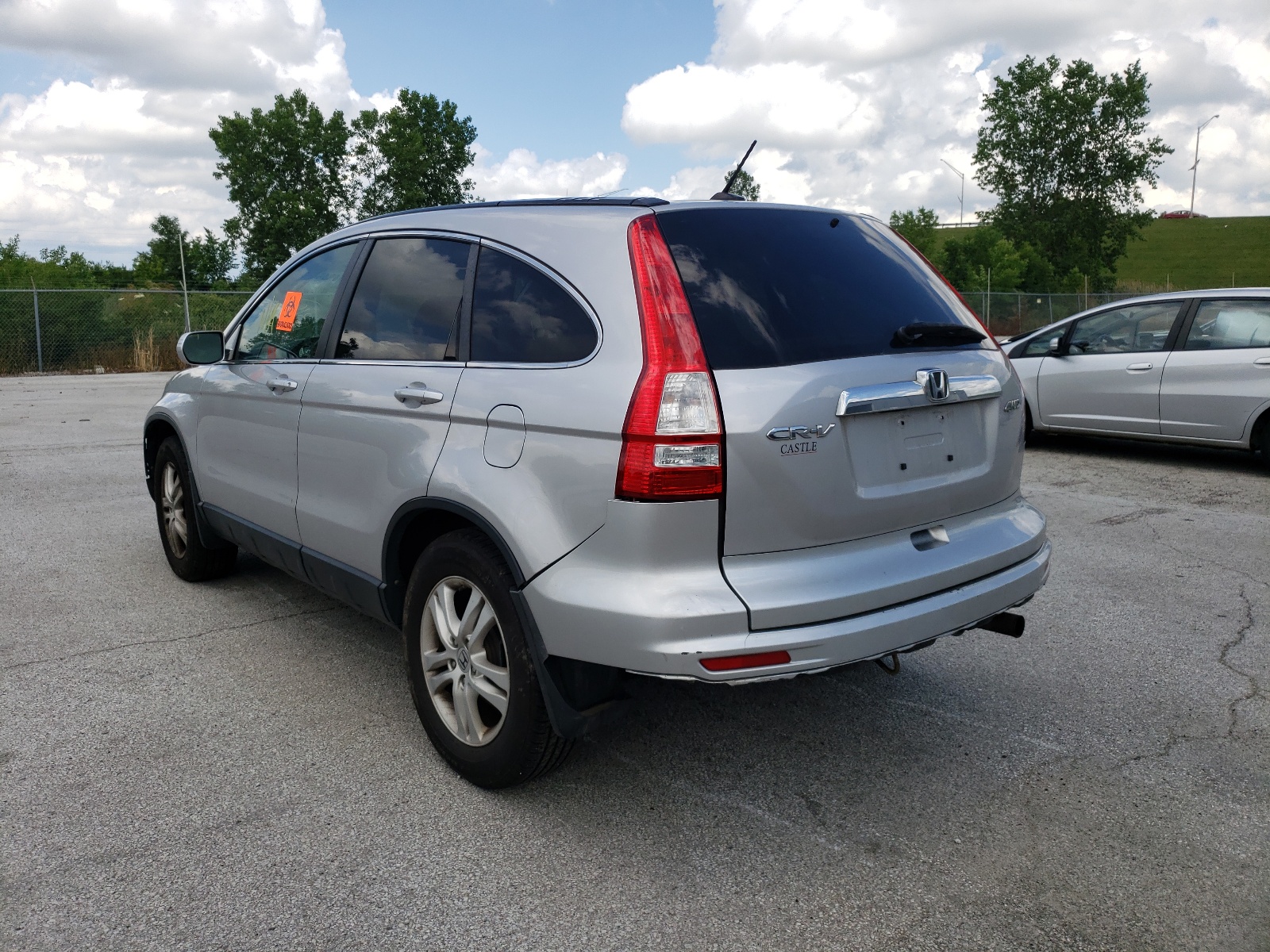 Photo 3 from auction – 2011 HONDA CR-V EXL with VIN 5J6RE4H76BL078070