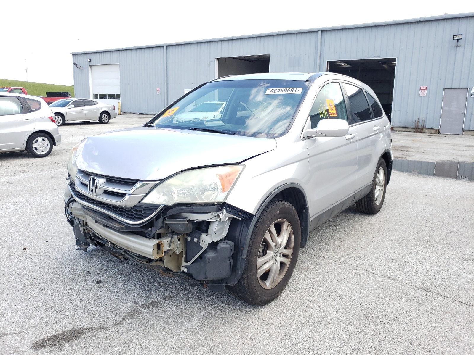 Photo 2 from auction – 2011 HONDA CR-V EXL with VIN 5J6RE4H76BL078070