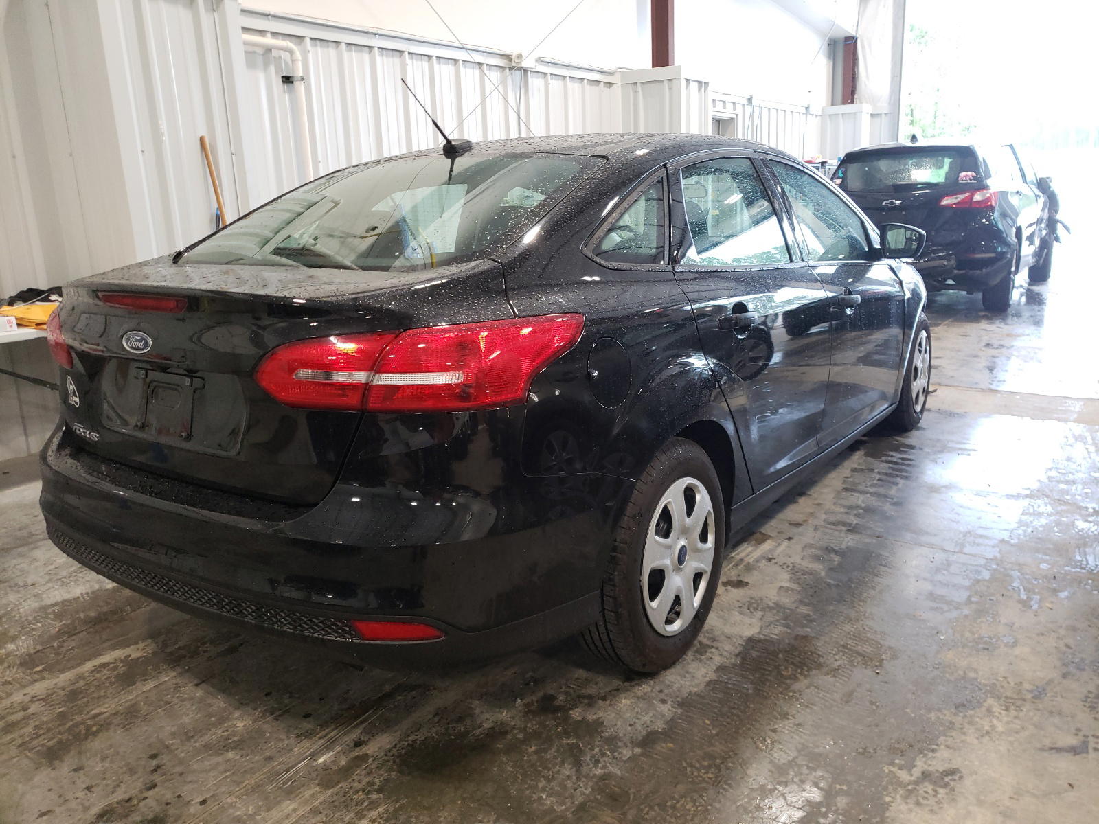 Photo 4 from auction – 2017 FORD FOCUS S with VIN 1FADP3E2XHL243145
