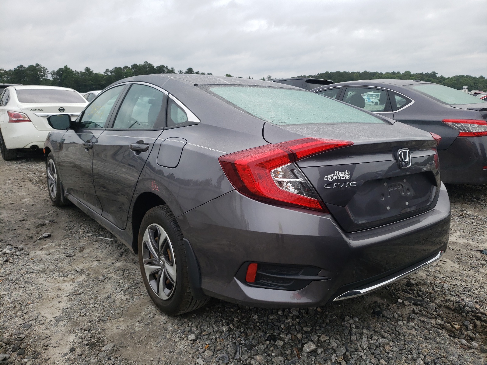 Photo 3 from auction – 2019 HONDA CIVIC LX with VIN 19XFC2F60KE039836