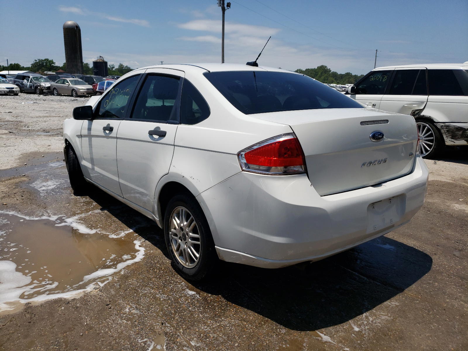 Photo 3 from auction – 2011 FORD FOCUS SE with VIN 1FAHP3FN8BW158756