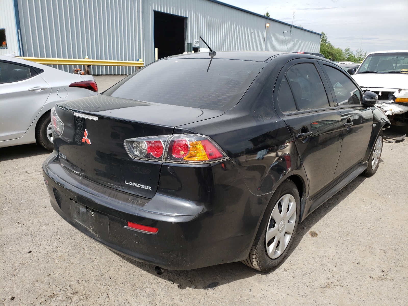 Photo 4 from auction – 2015 MITSUBISHI LANCER ES with VIN JA32U2FU5FU011918