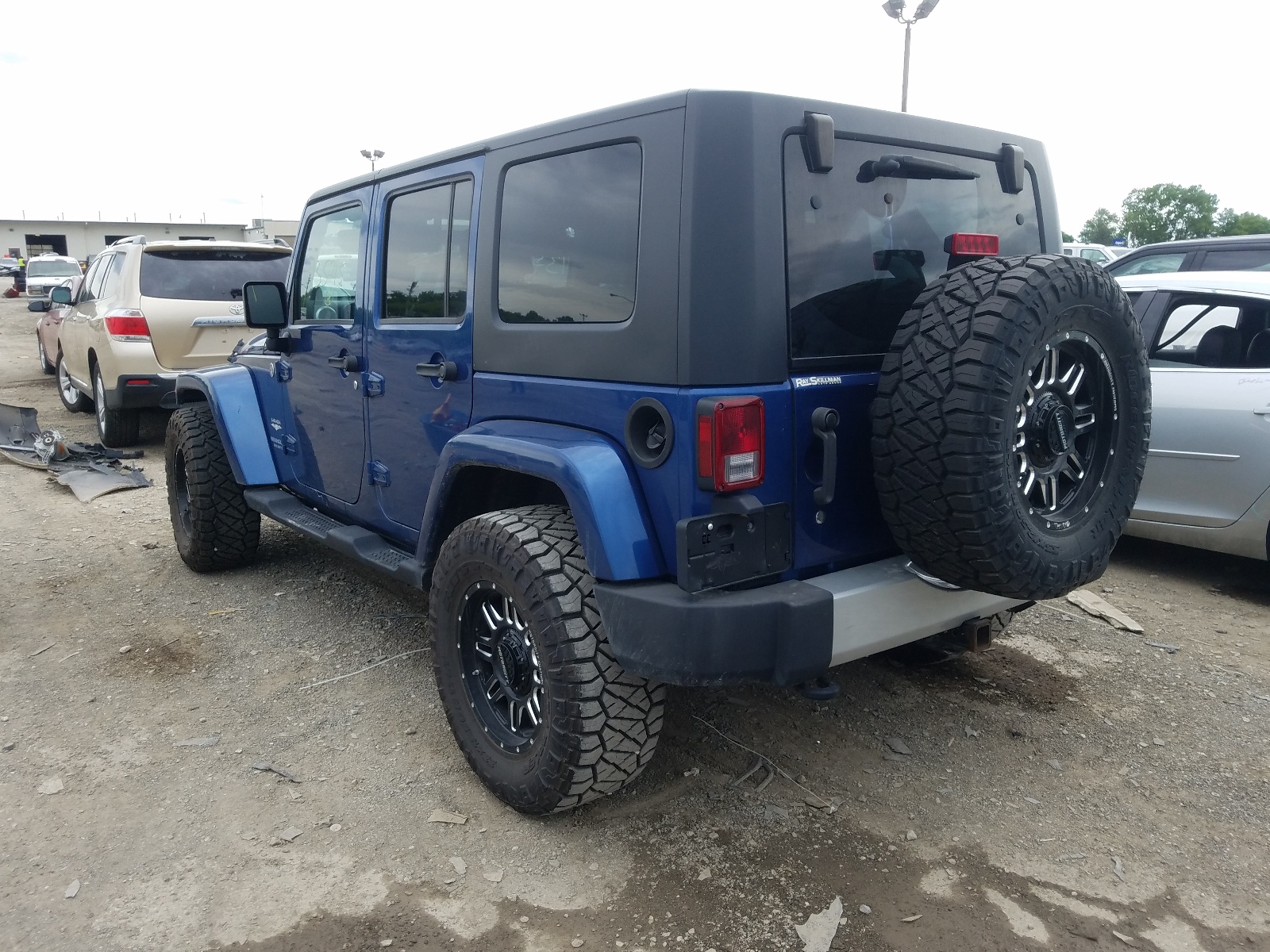 Photo 3 from auction – 2010 JEEP WRANGLER U with VIN 1J4BA5H10AL135215