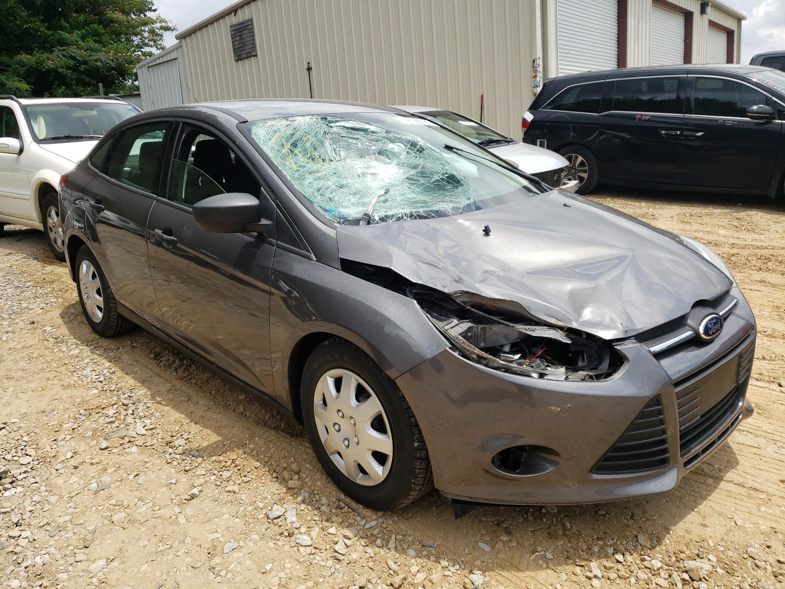 FORD FOCUS S 2013 with VIN 1FADP3E29DL111956 - Photo from auction
