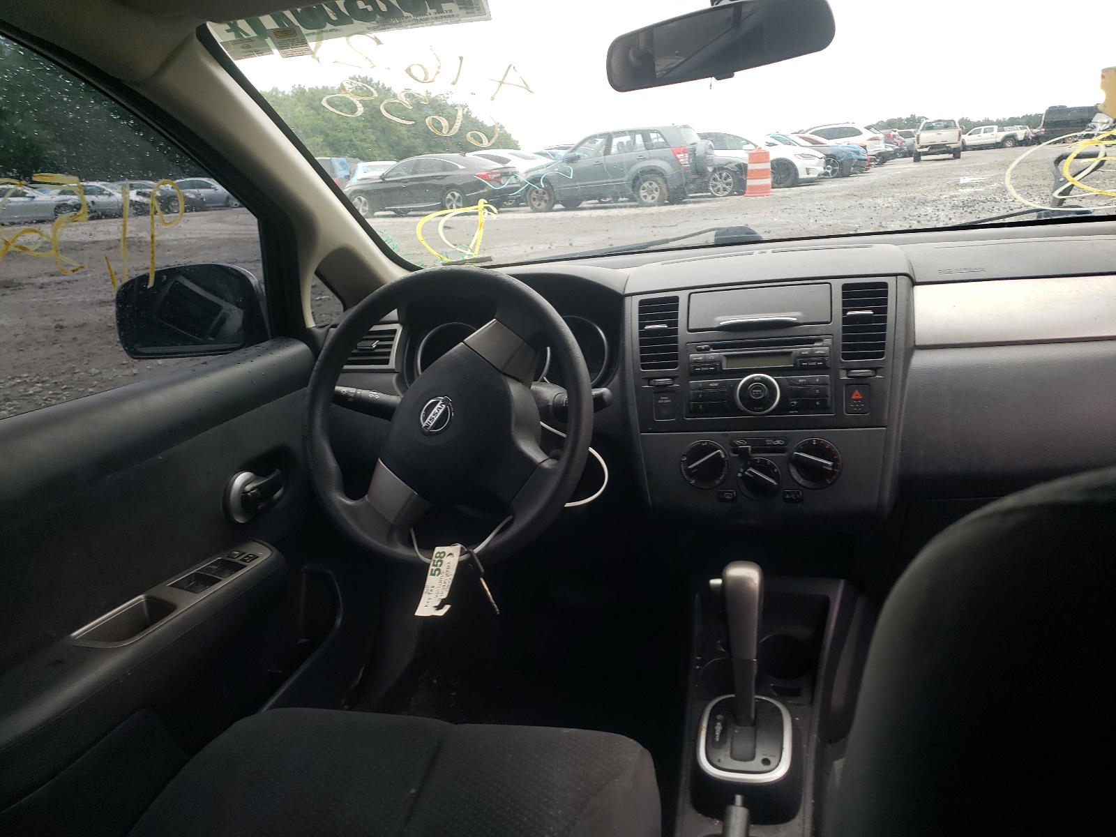 Photo 9 from auction – 2011 NISSAN VERSA S with VIN 3N1BC1CP9BL516638