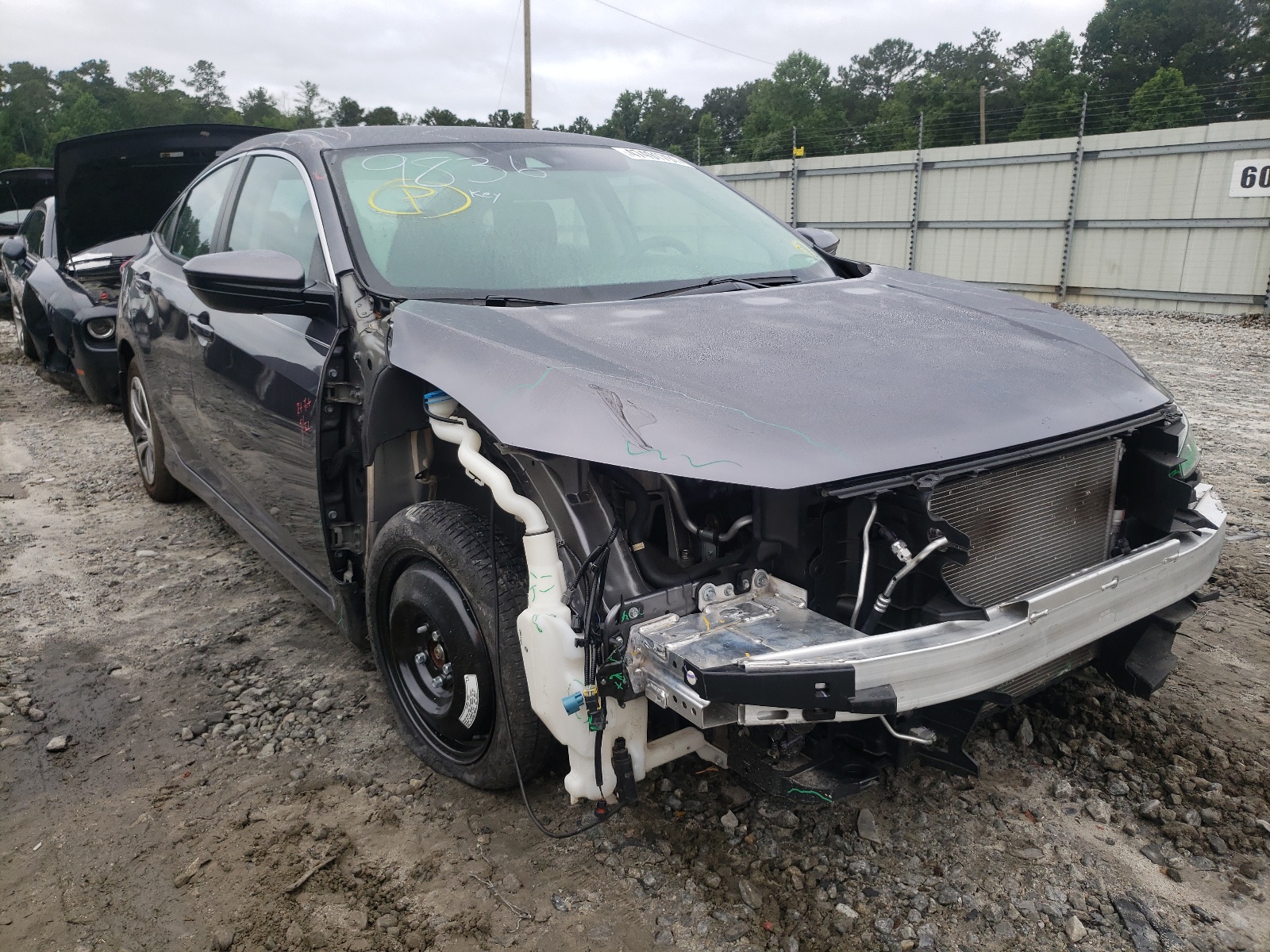 HONDA CIVIC LX 2019 with VIN 19XFC2F60KE039836 - Photo from auction
