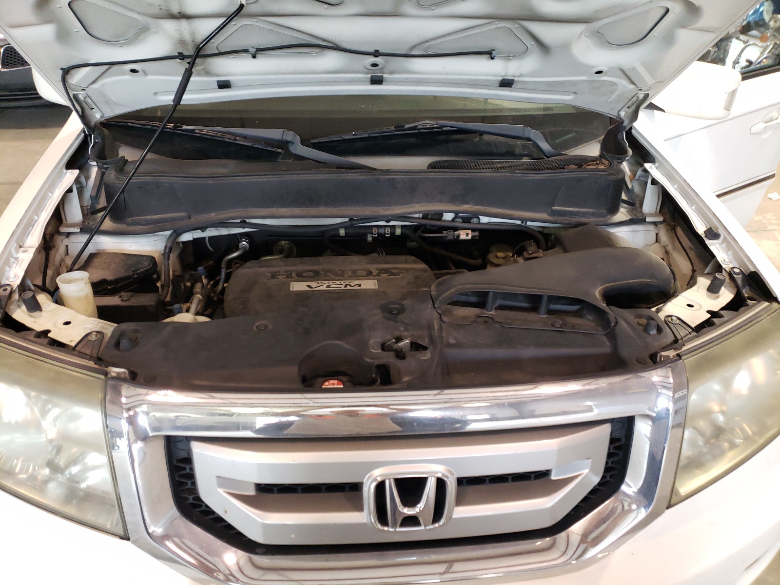 Photo 7 from auction – 2010 HONDA PILOT TOUR with VIN 5FNYF3H81AB001027