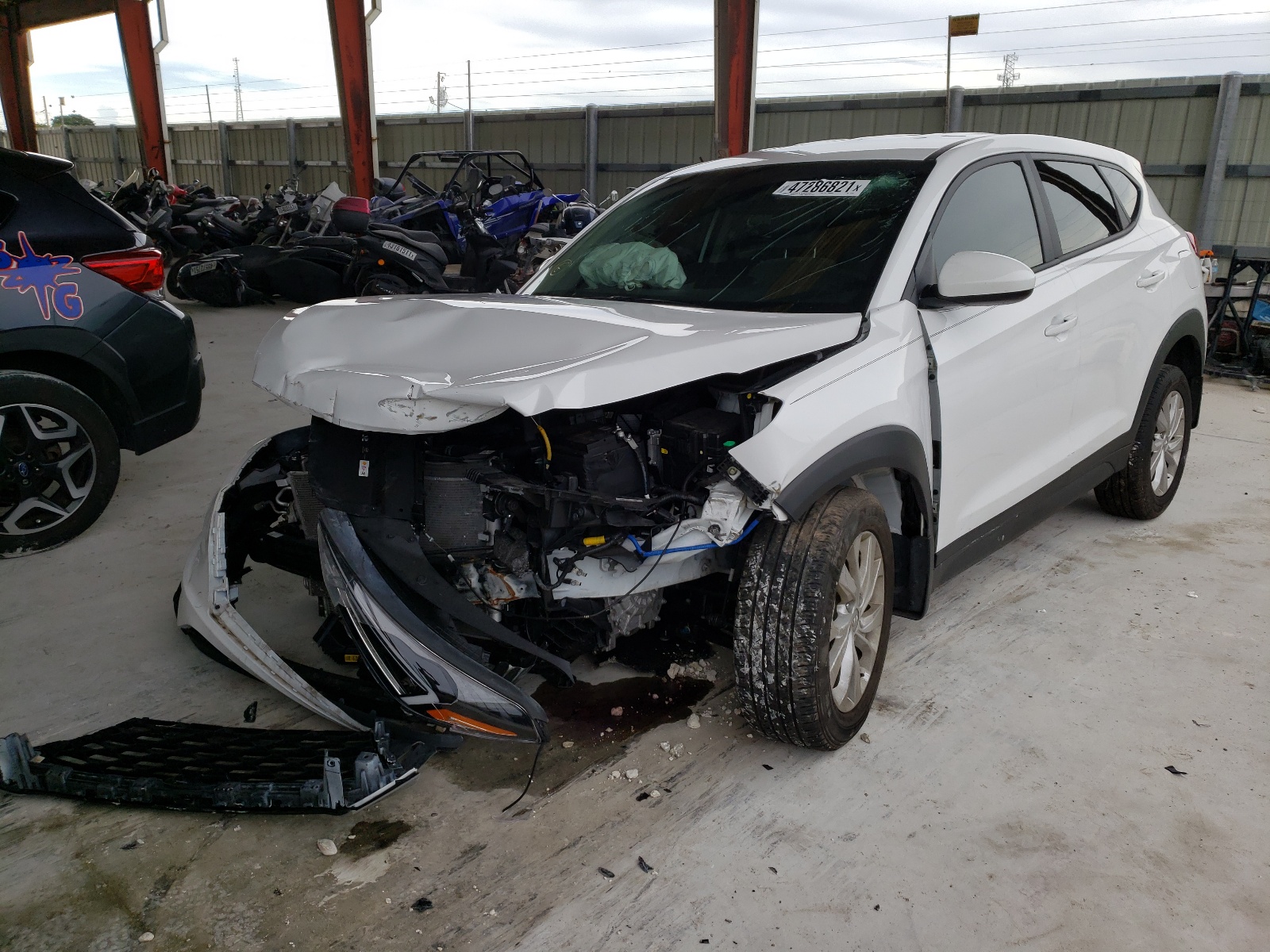 Photo 2 from auction – 2020 HYUNDAI TUCSON SE with VIN KM8J23A40LU225397