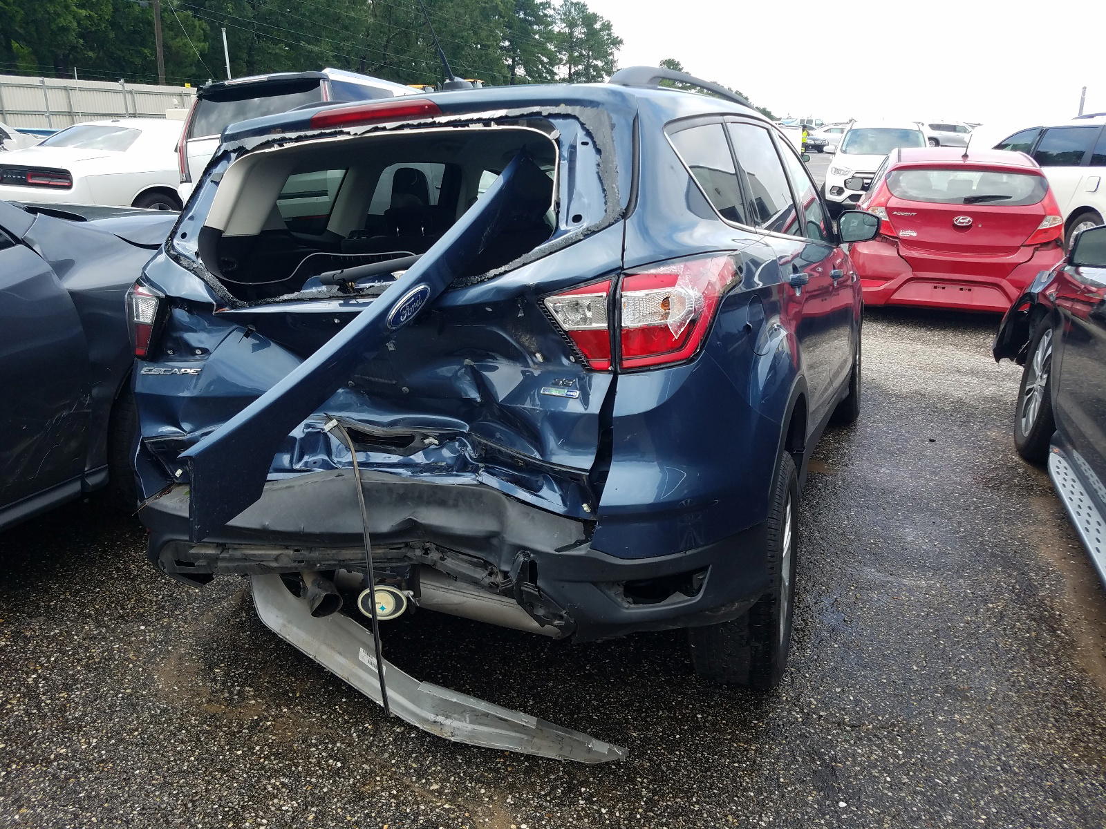 Photo 4 from auction – 2018 FORD ESCAPE SE with VIN 1FMCU9GD3JUB12943