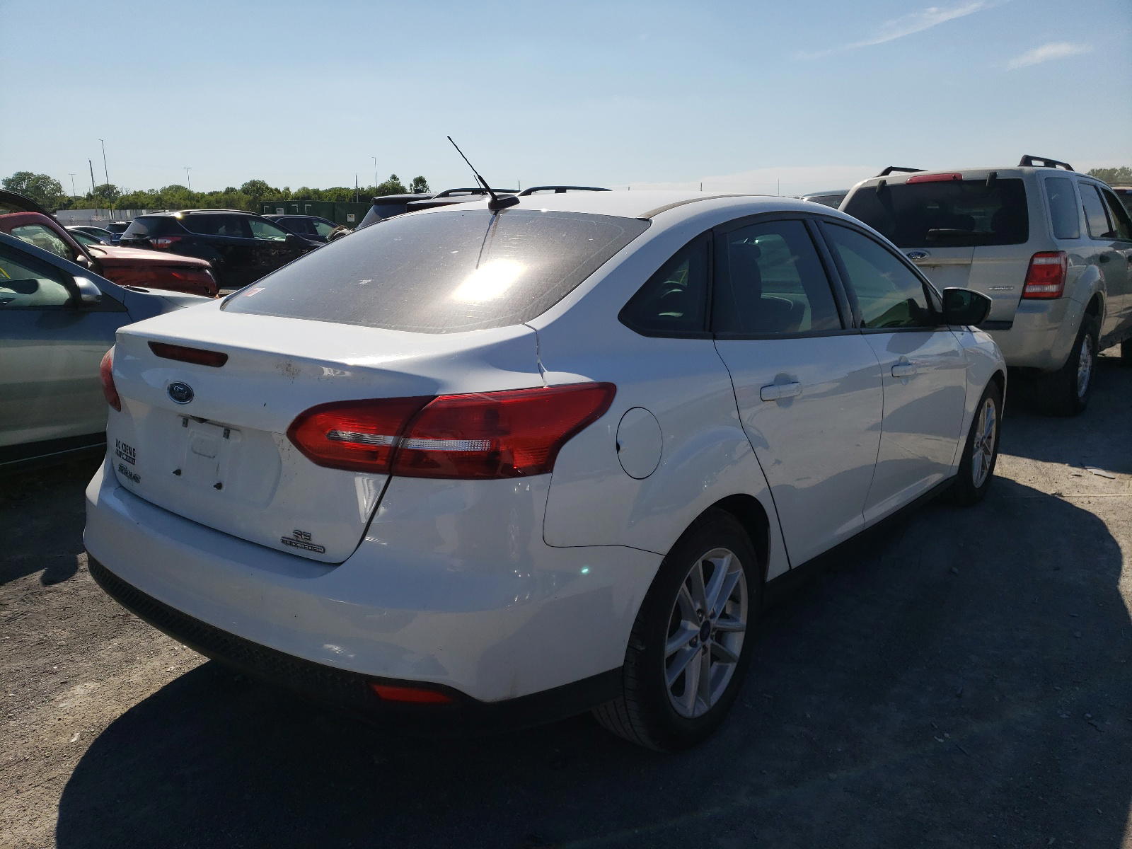 Photo 4 from auction – 2016 FORD FOCUS SE with VIN 1FADP3F29GL340835