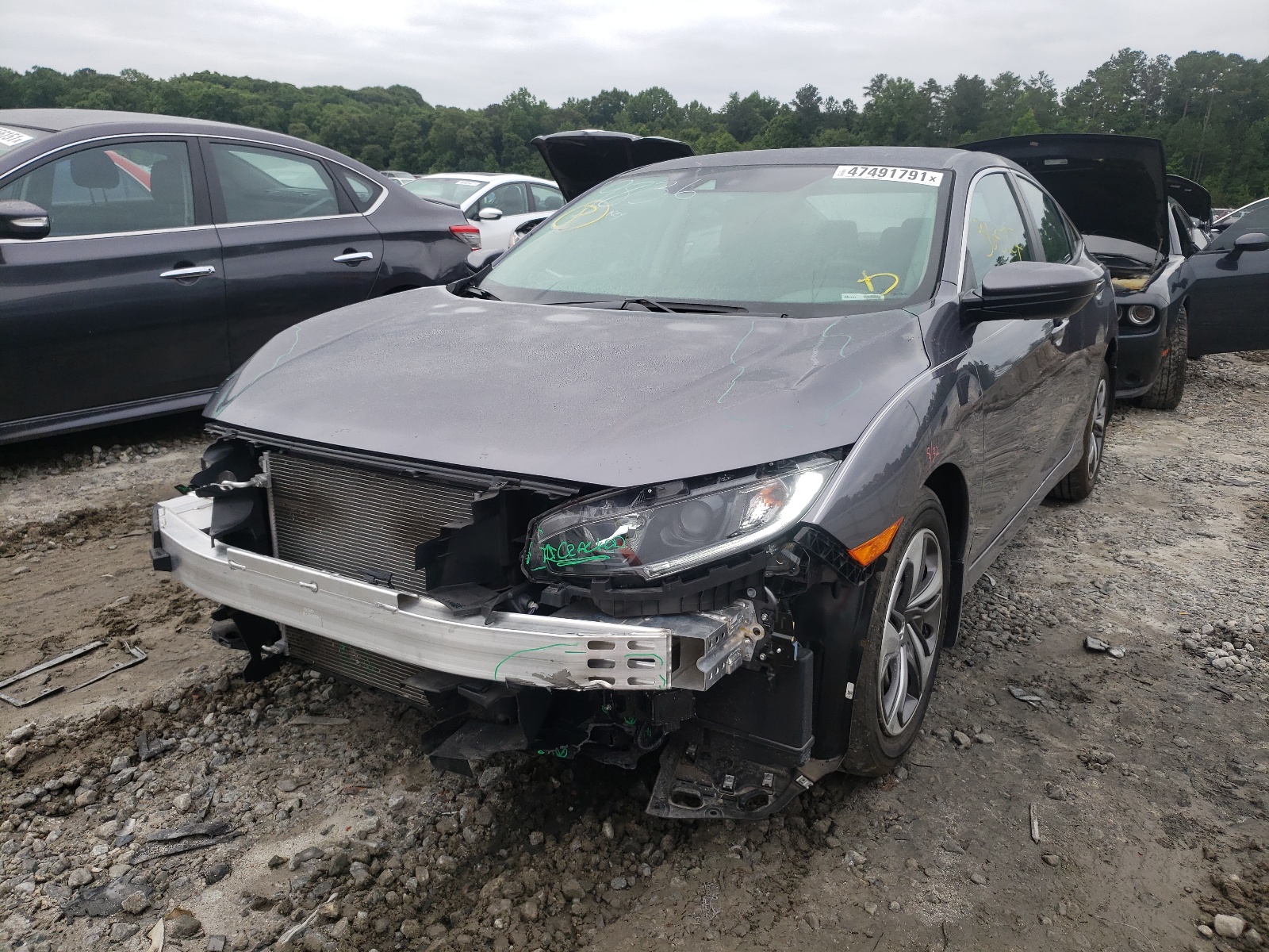 Photo 2 from auction – 2019 HONDA CIVIC LX with VIN 19XFC2F60KE039836
