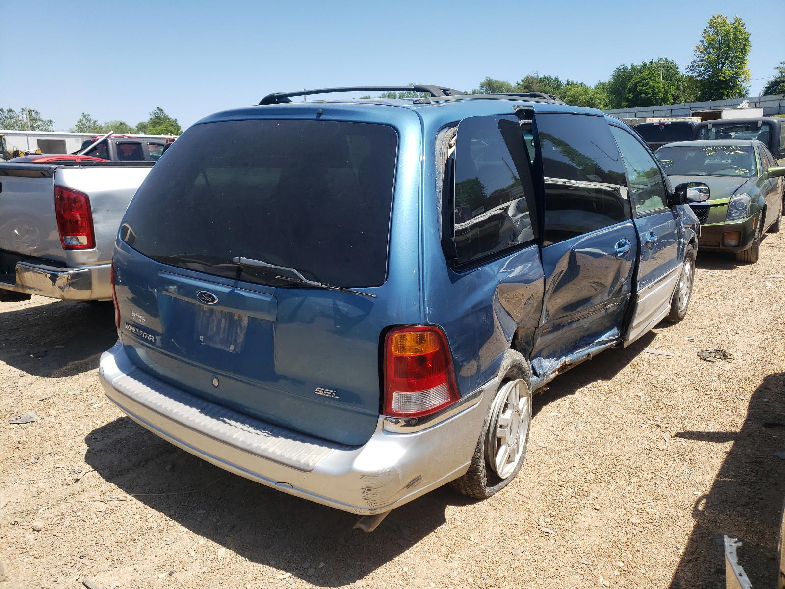 Photo 4 from auction – 2002 FORD WINDSTAR S with VIN 2FMZA534X2BA40387
