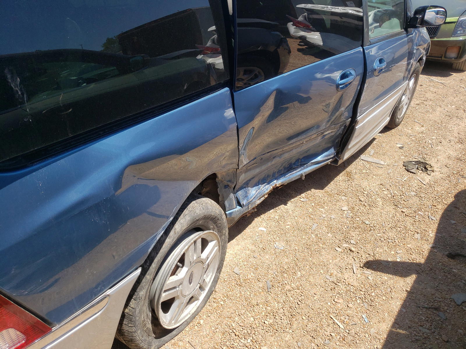 Photo 9 from auction – 2002 FORD WINDSTAR S with VIN 2FMZA534X2BA40387