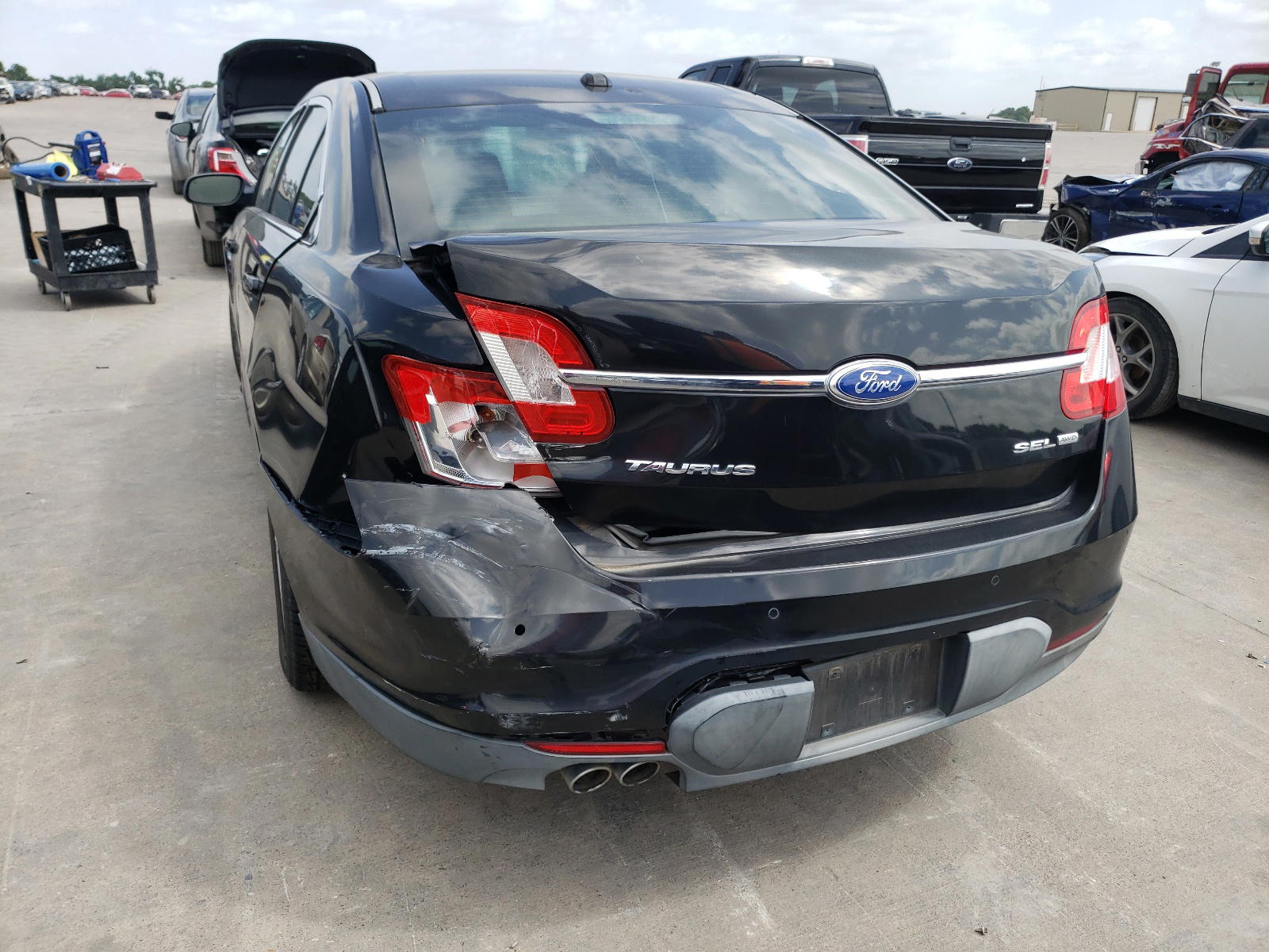 Photo 9 from auction – 2011 FORD TAURUS SEL with VIN 1FAHP2HW4BG159915