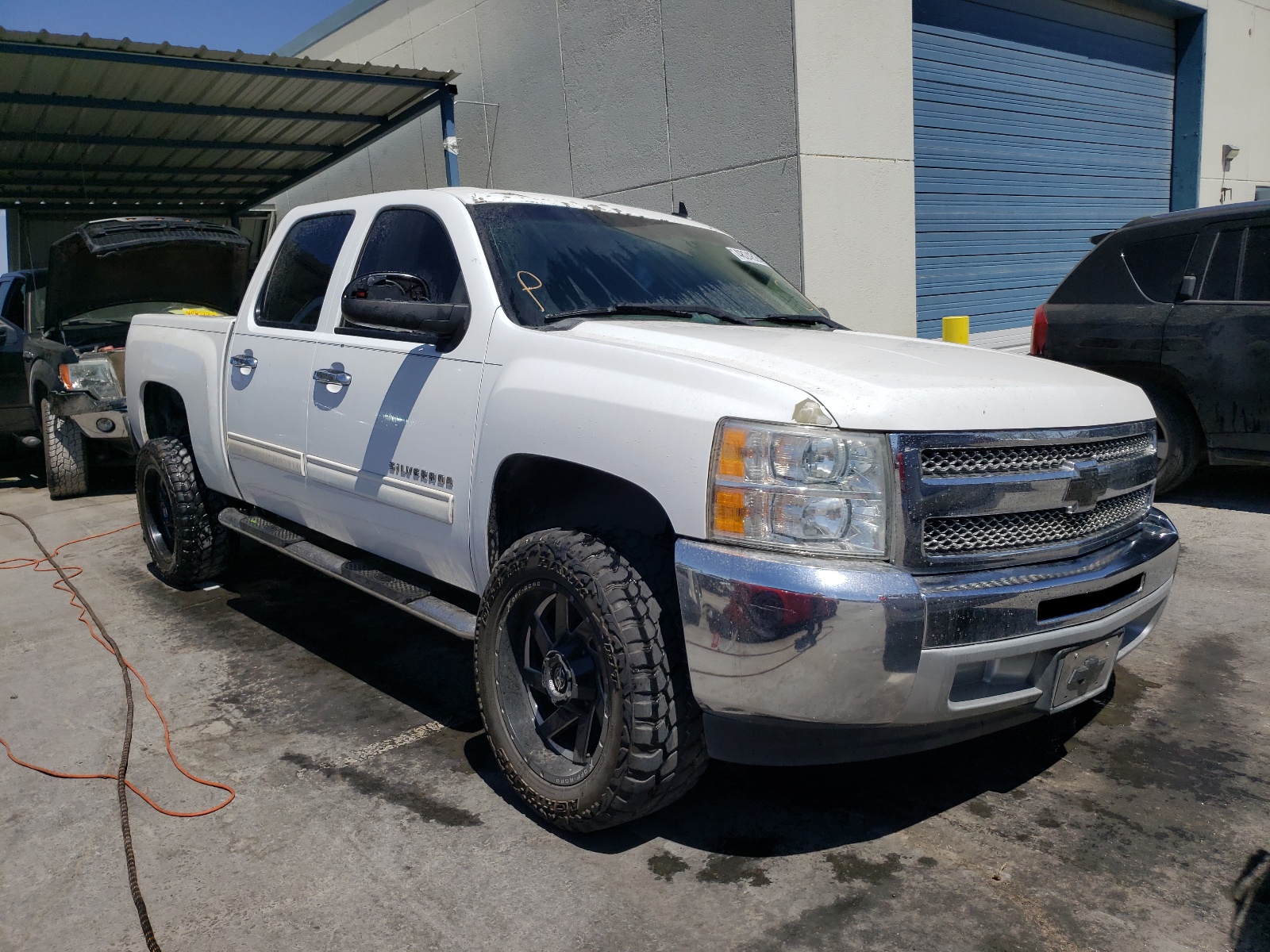 CHEVROLET SILVERADO 2013 with VIN 3GCPCSEA9DG112641 - Photo from auction