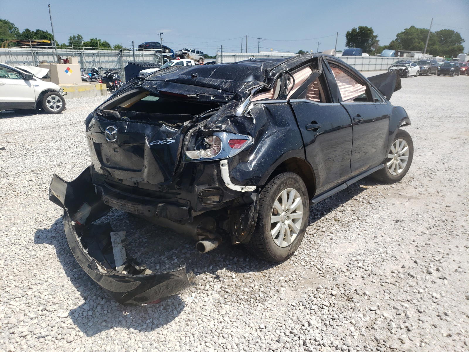 Photo 4 from auction – 2010 MAZDA CX-7 with VIN JM3ER2W59A0344851