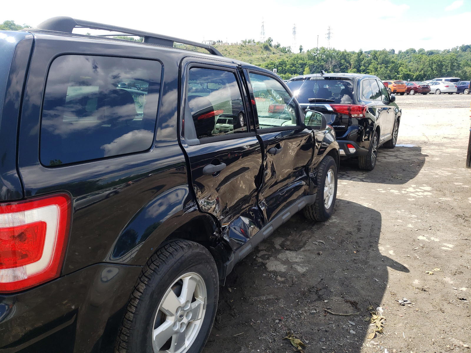 Photo 9 from auction – 2010 FORD ESCAPE XLT with VIN 1FMCU9DG2AKD24940