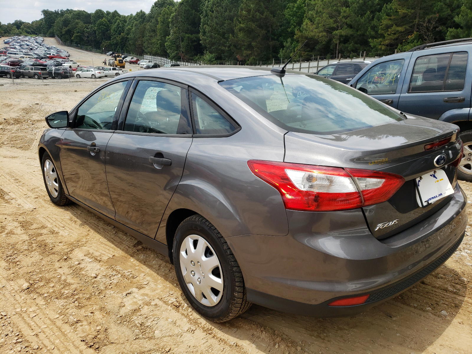 Photo 3 from auction – 2013 FORD FOCUS S with VIN 1FADP3E29DL111956