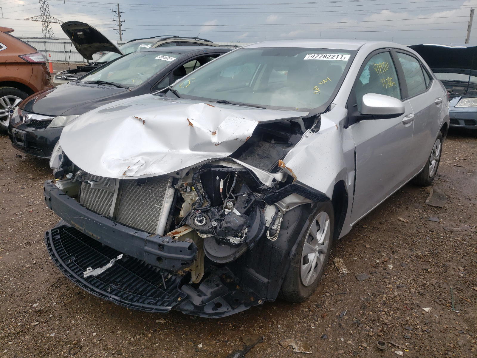 Photo 2 from auction – 2014 TOYOTA COROLLA L with VIN 5YFBURHEXEP070684