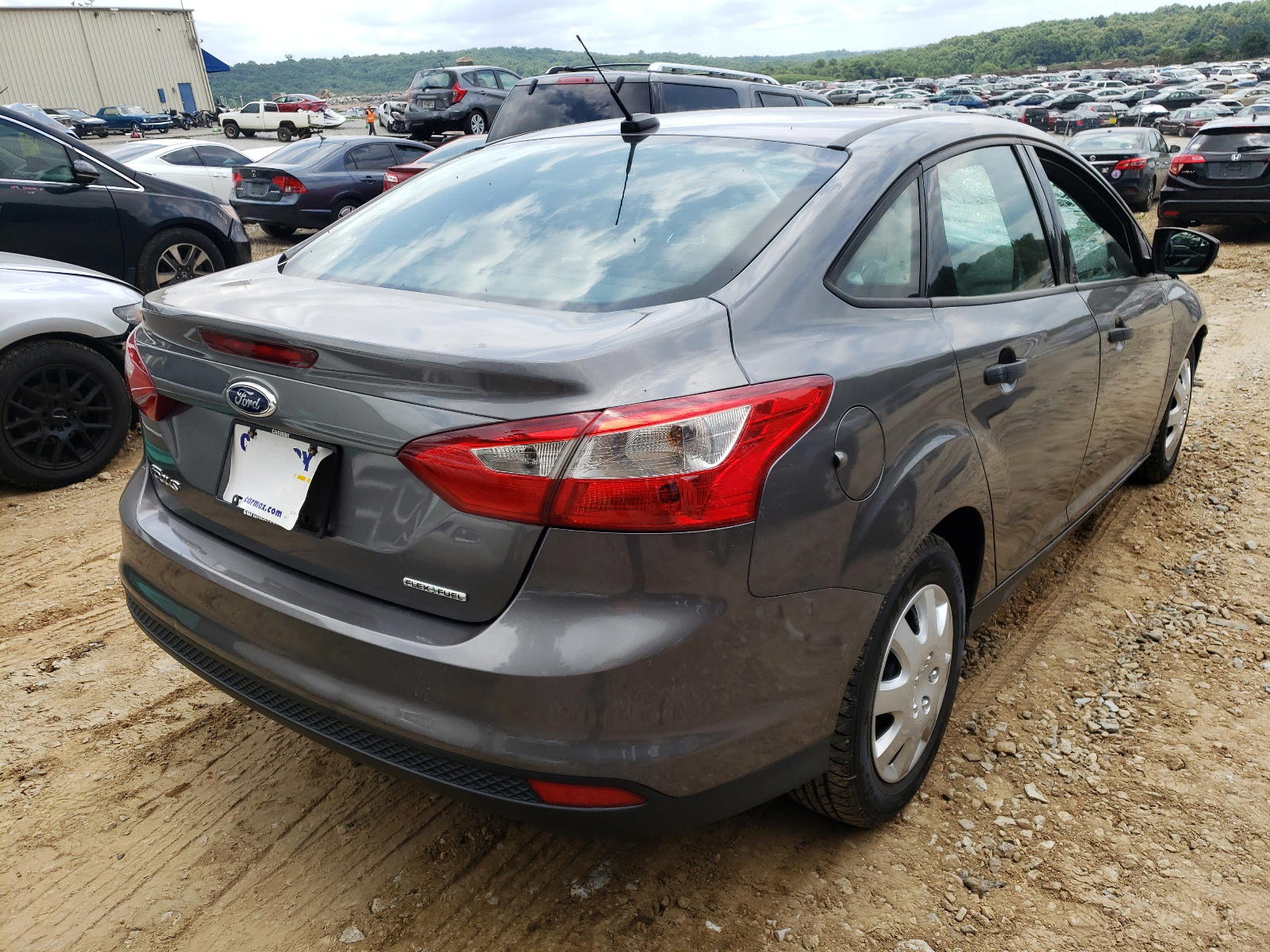 Photo 4 from auction – 2013 FORD FOCUS S with VIN 1FADP3E29DL111956