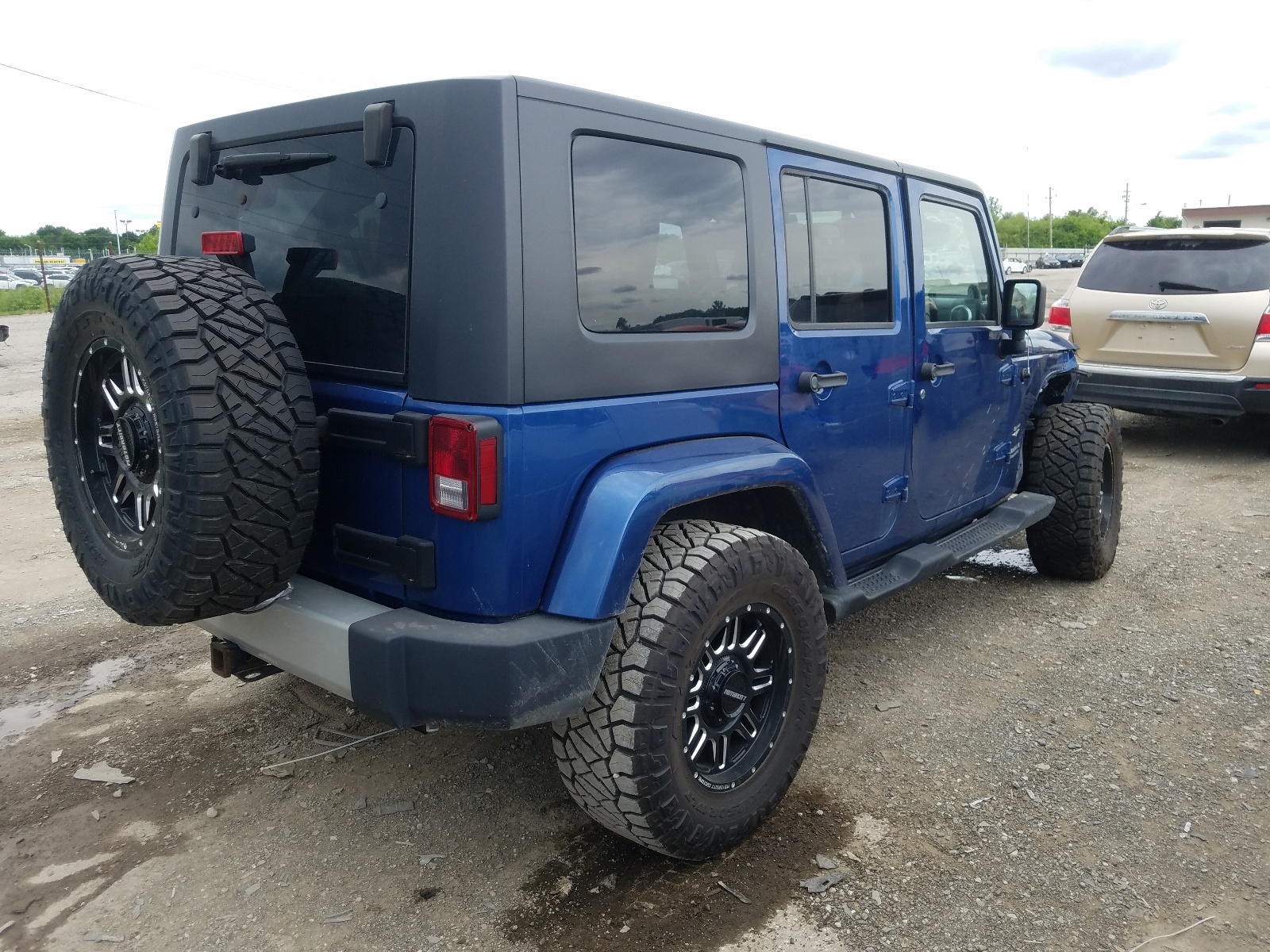 Photo 4 from auction – 2010 JEEP WRANGLER U with VIN 1J4BA5H10AL135215