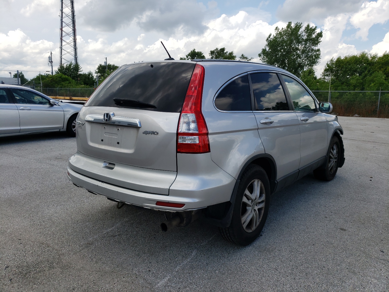 Photo 4 from auction – 2011 HONDA CR-V EXL with VIN 5J6RE4H76BL078070
