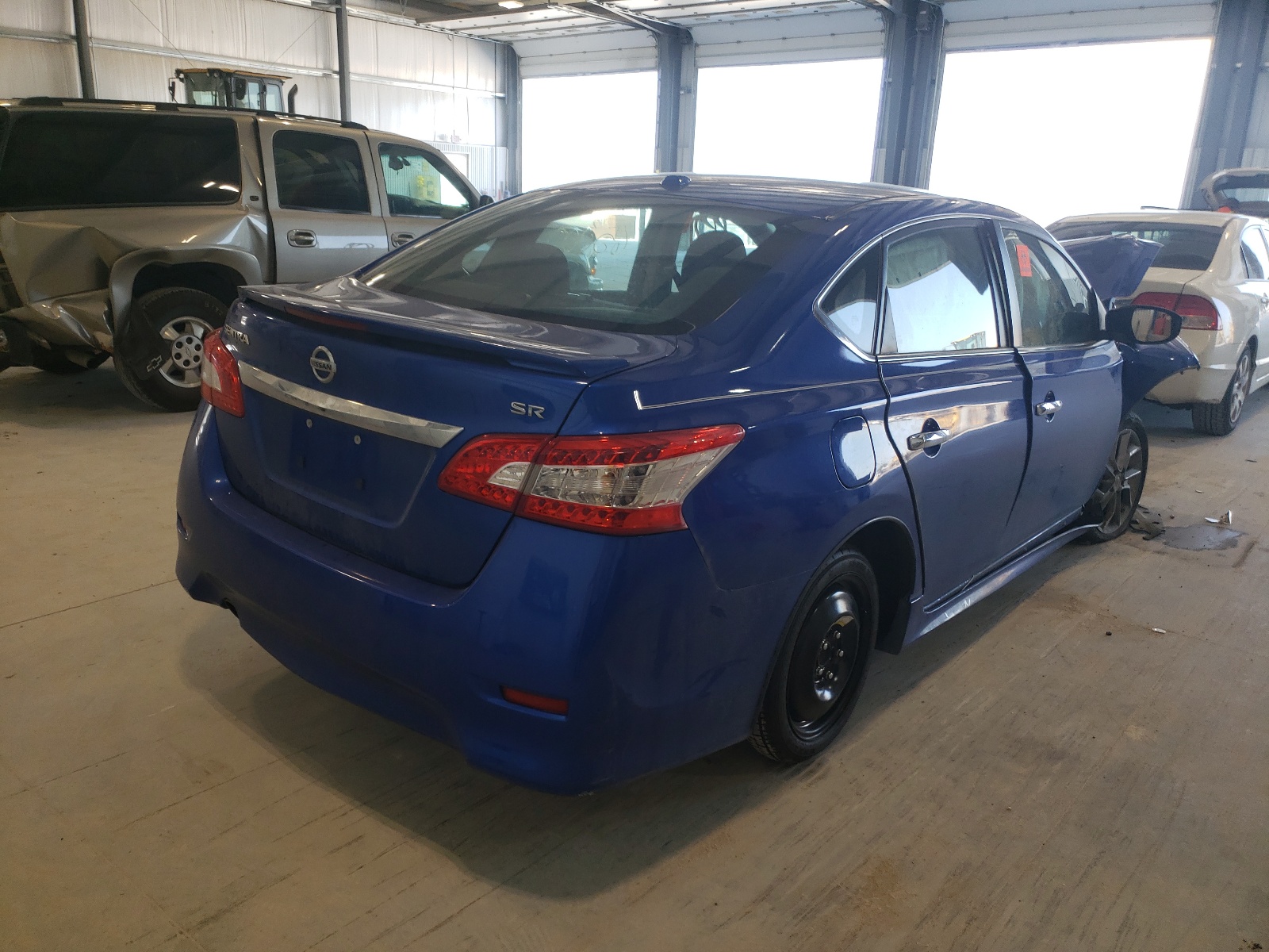 Photo 4 from auction – 2015 NISSAN SENTRA S with VIN 3N1AB7AP1FY233535