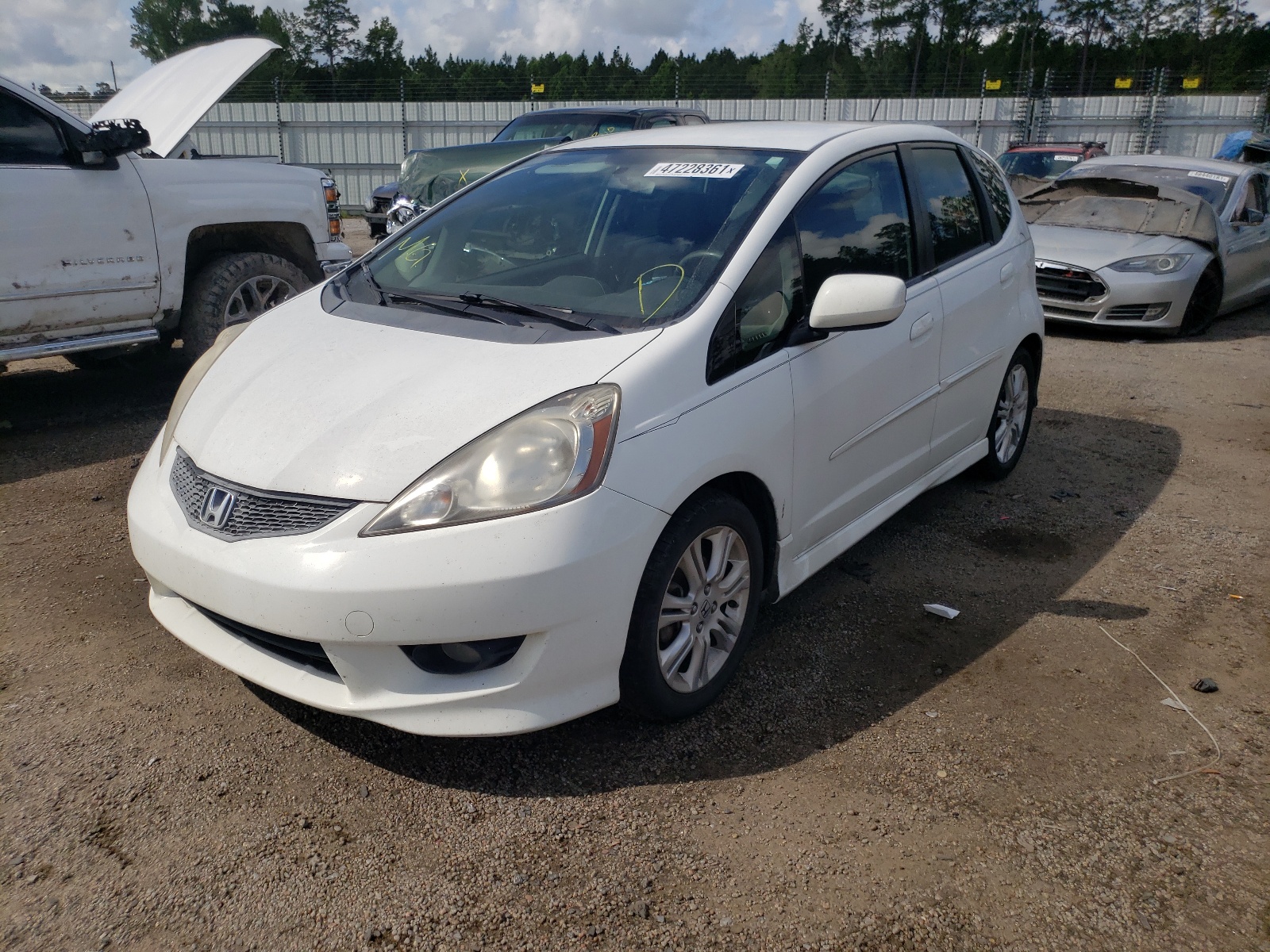 Photo 2 from auction – 2009 HONDA FIT with VIN JHMGE874X9S021168