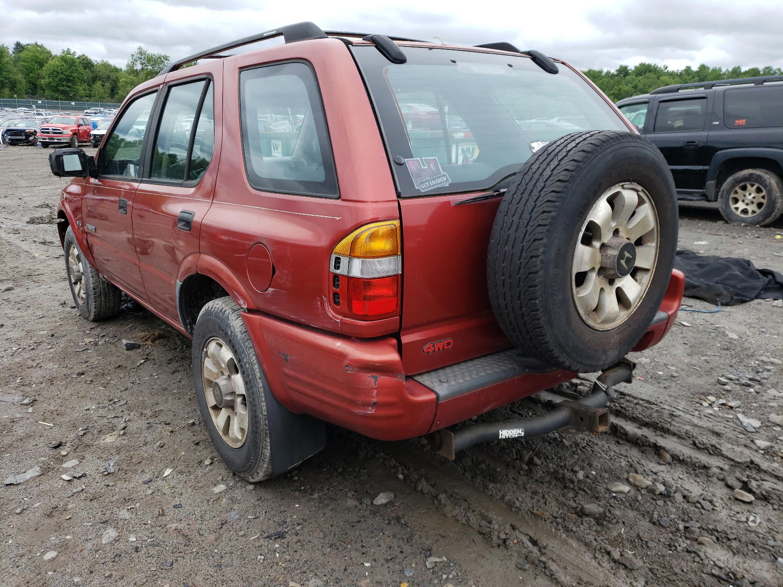 Photo 3 from auction – 1999 HONDA PASSPORT E with VIN 4S6CM58W2X4411753