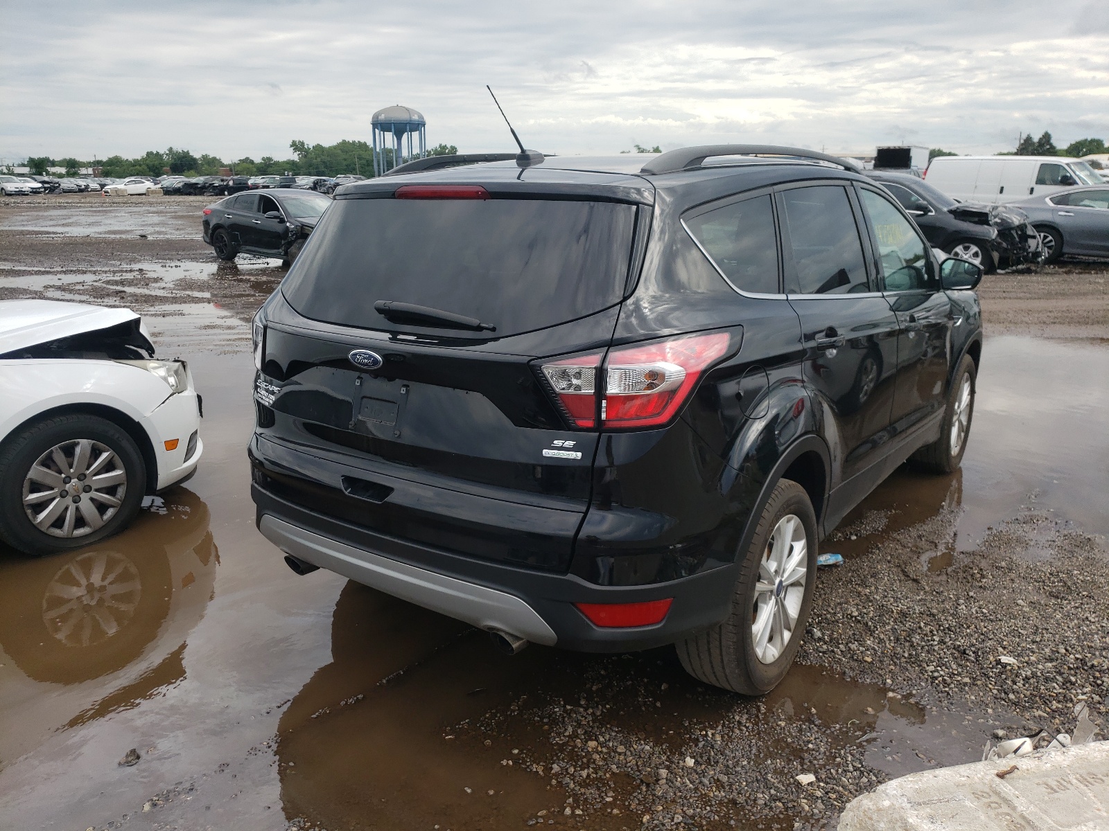 Photo 4 from auction – 2018 FORD ESCAPE SE with VIN 1FMCU0GD3JUA40136