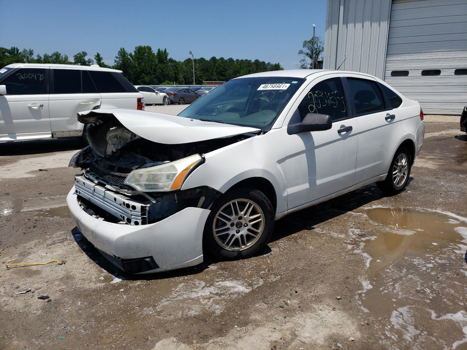 Photo 2 from auction – 2011 FORD FOCUS SE with VIN 1FAHP3FN8BW158756