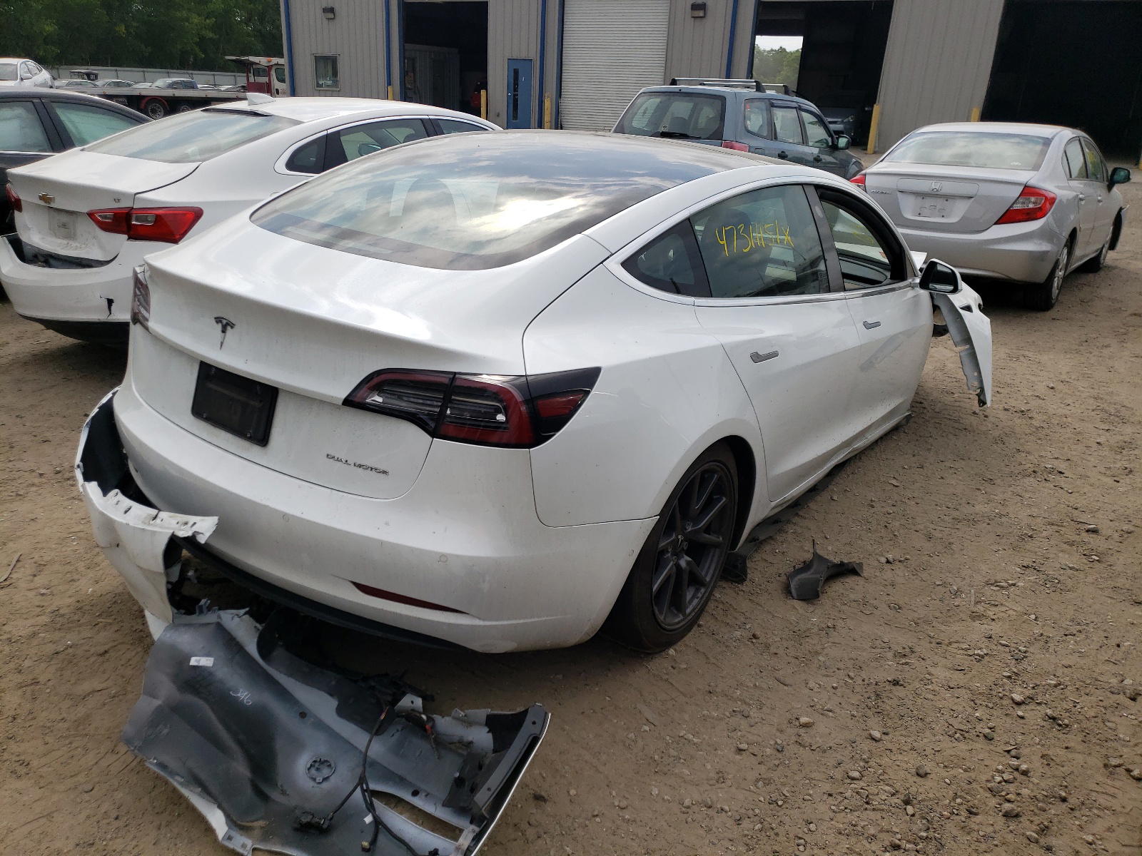 Photo 4 from auction – 2019 TESLA MODEL 3 with VIN 5YJ3E1EB2KF493893