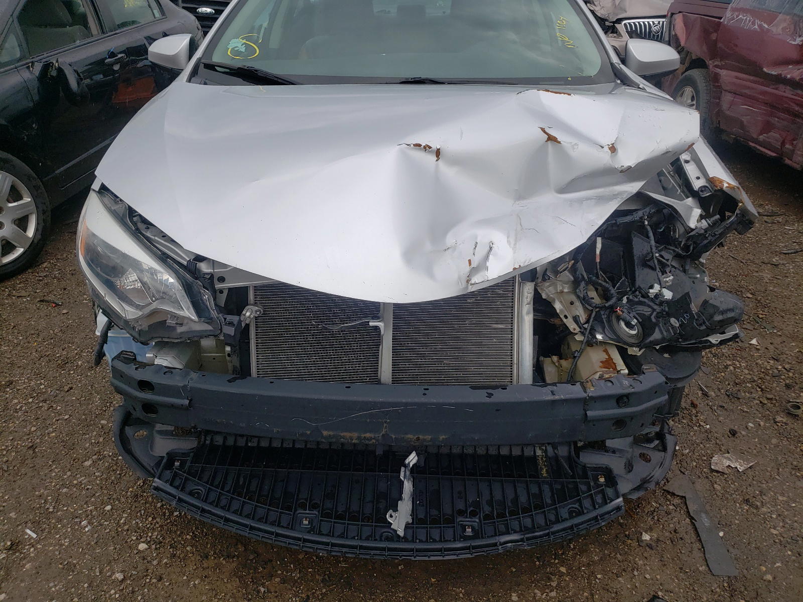 Photo 9 from auction – 2014 TOYOTA COROLLA L with VIN 5YFBURHEXEP070684