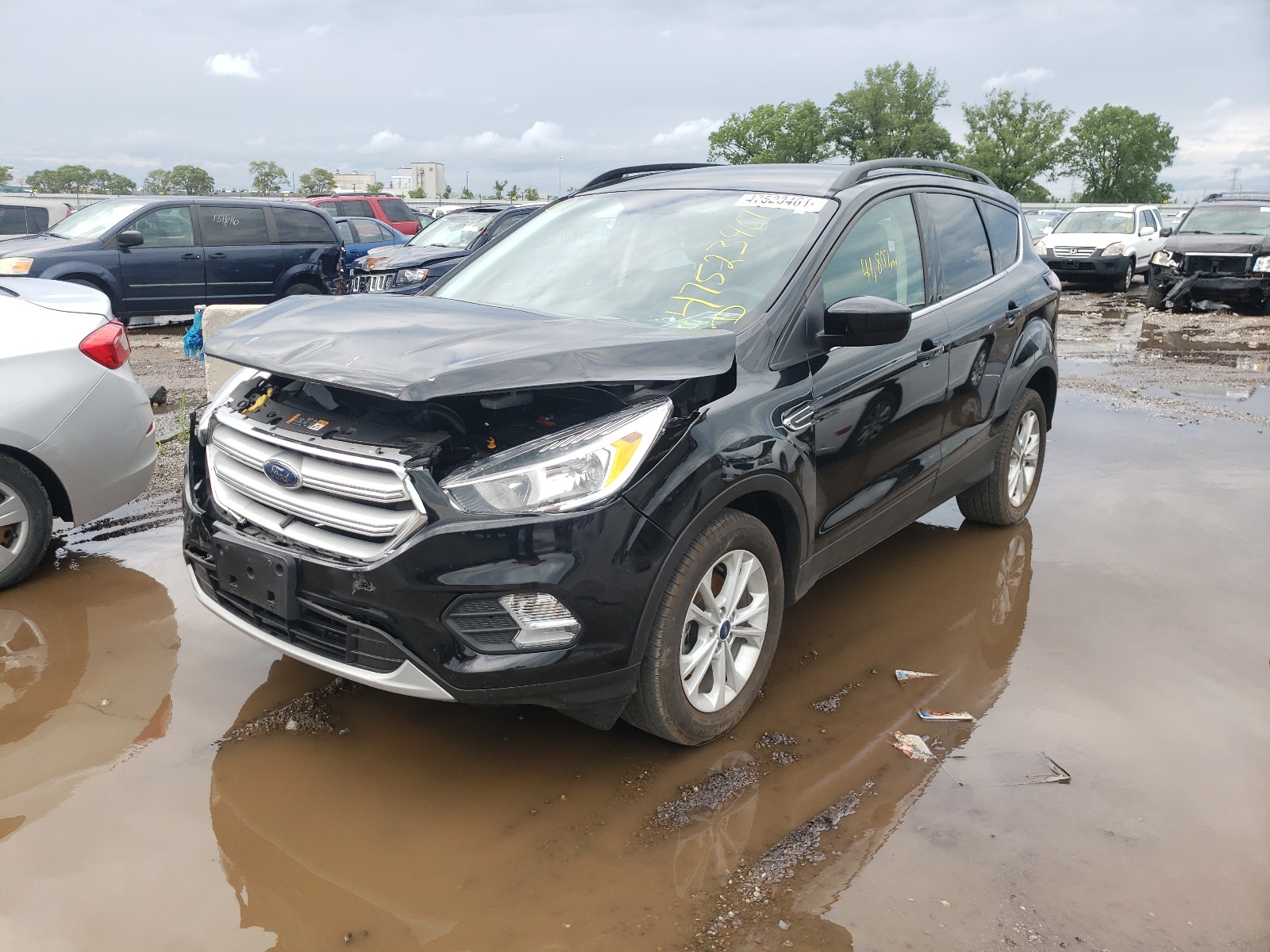 Photo 2 from auction – 2018 FORD ESCAPE SE with VIN 1FMCU0GD3JUA40136