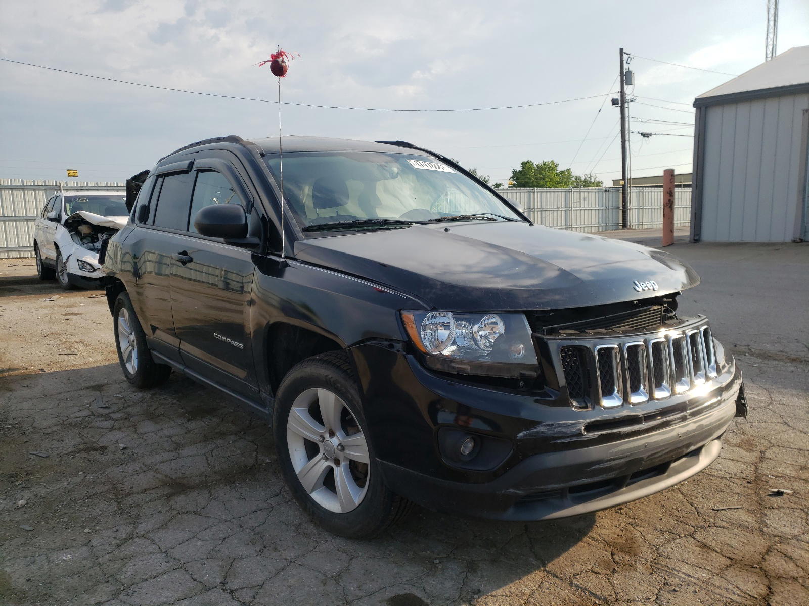 JEEP COMPASS SP 2016 with VIN 1C4NJDBB1GD521580 - Photo from auction