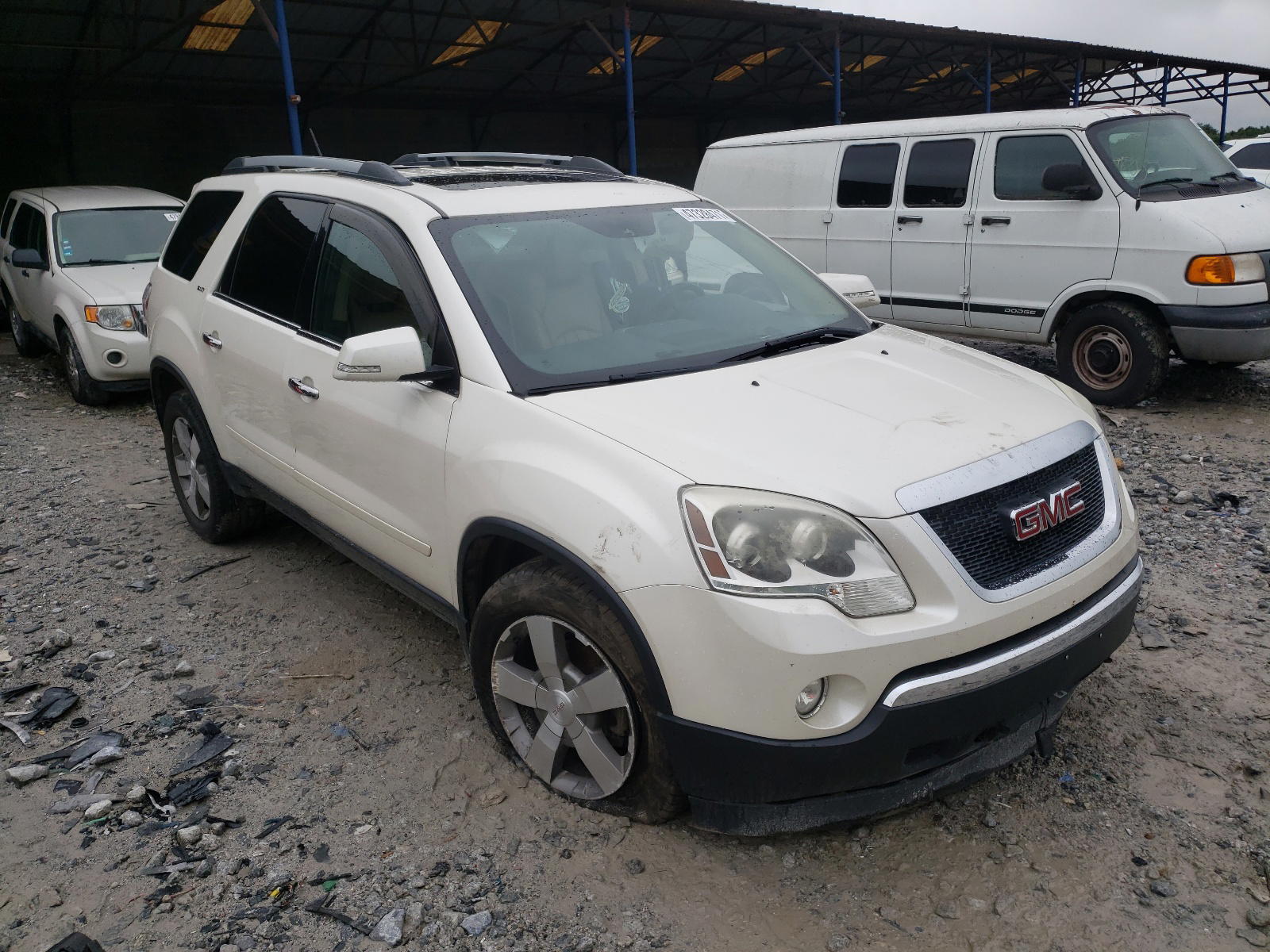 GMC ACADIA SLT 2011 with VIN 1GKKRSED5BJ222279 - Photo from auction
